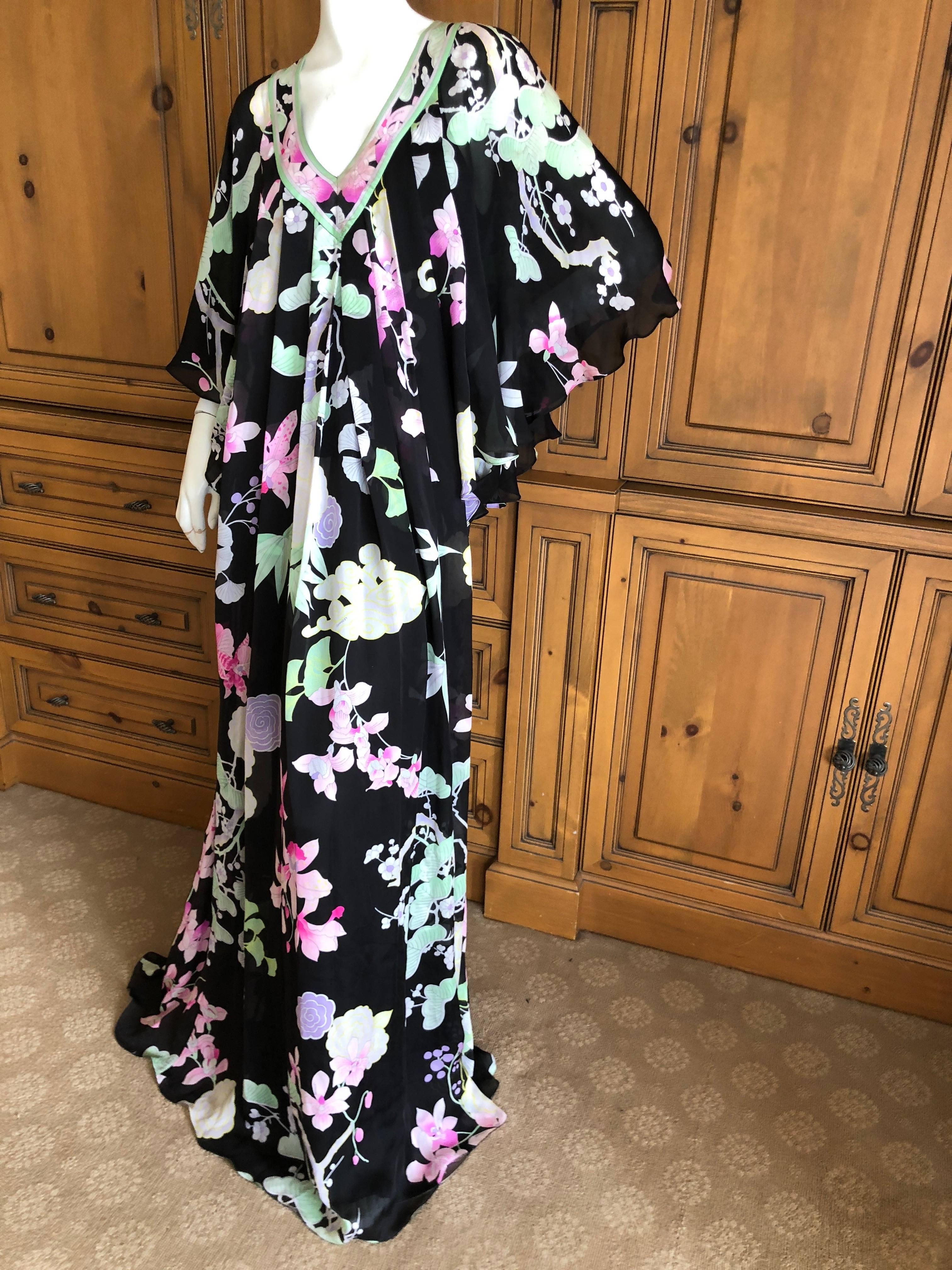 Leonard Paris Vintage Cape Back Caftan Dress
Leonard Paris was a contemporary of Pucci, both houses creating brilliant 60's patterns on silk jersey.
 Both were very expensive, and carried in the best stores internationally.

Size M
Bust 42
