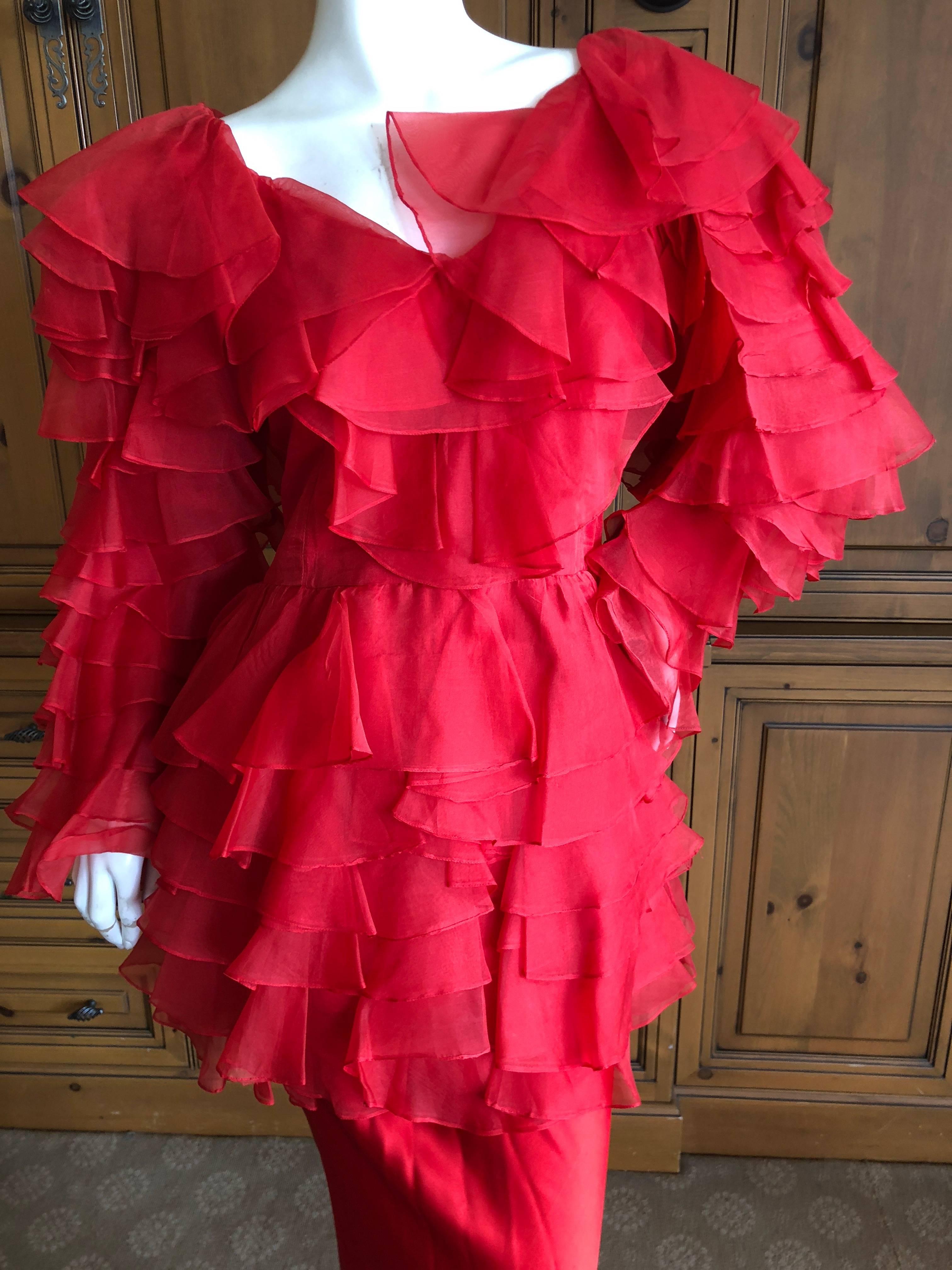 Cardinali 1970s Scarlet Red Ruffled Top and Bias Cut Silk Skirt with Fascinator.

From the Archive of Marilyn Lewis, the creator of Cardinali
Cardinali was founded in Los Angeles in 1970, by Marilyn Lewis, who had already found success as the