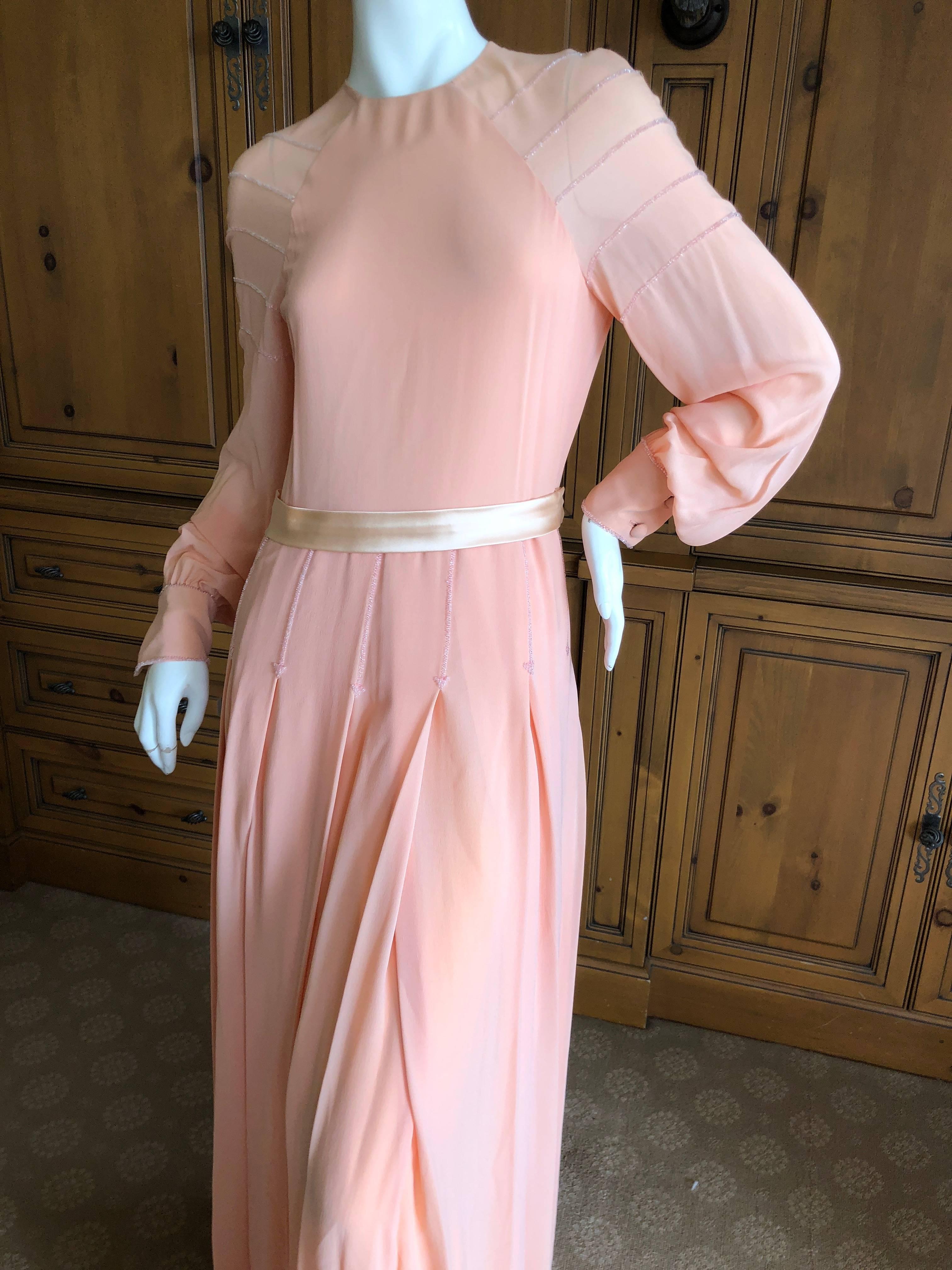 Cardinali 1970's Apricot Chiffon Beaded Evening Dress

From the Archive of Marilyn Lewis, the creator of Cardinali
Cardinali was founded in Los Angeles in 1970, by Marilyn Lewis, who had already found success as the founder and owner of the hot 60's