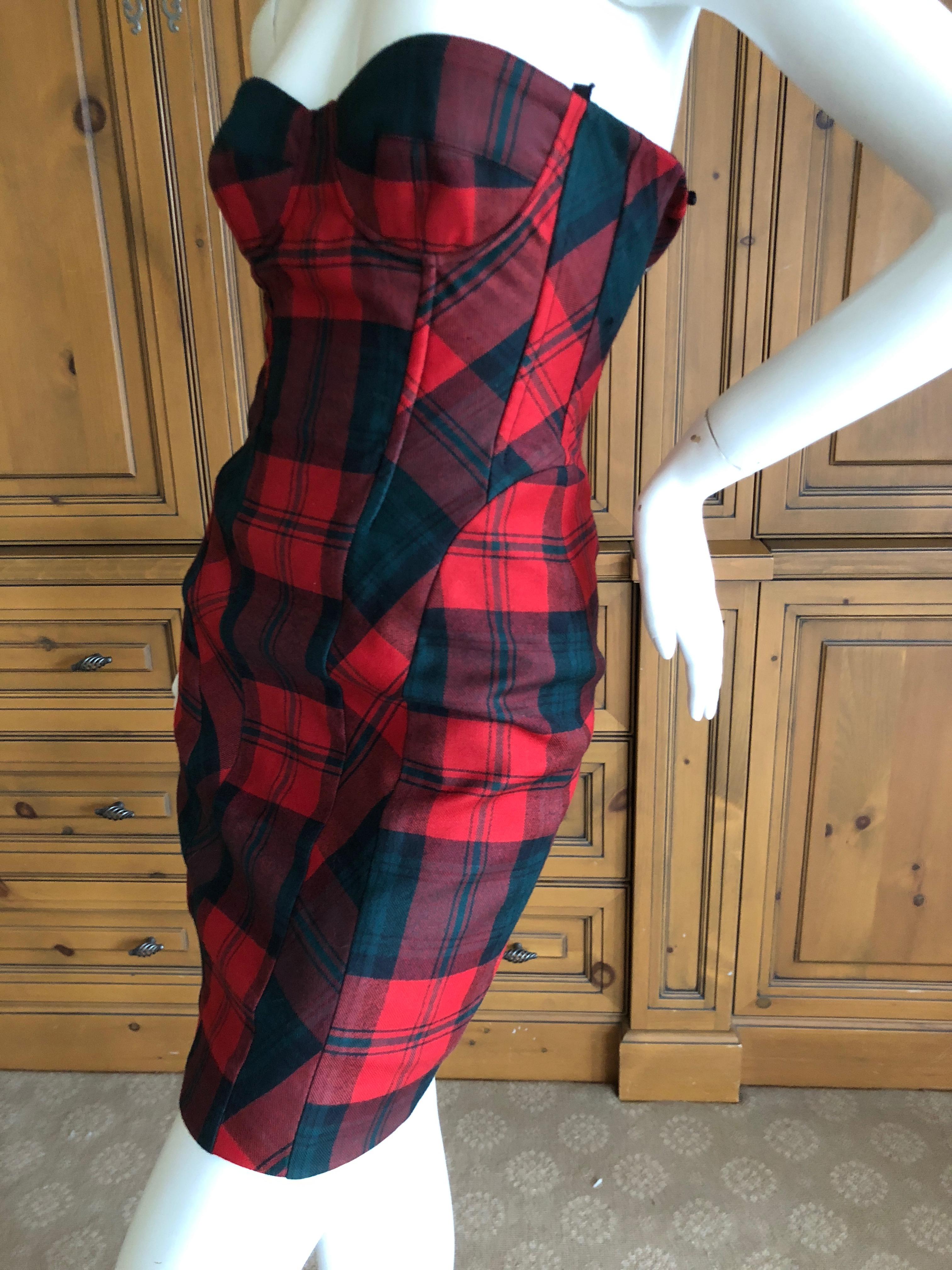 Dolce & Gabbana D&G Vintage Plaid Cocktail Mini Dress  
  There is  a lot of stretch
Marked Size 48, but runs small more like a 38-40
Bust 34