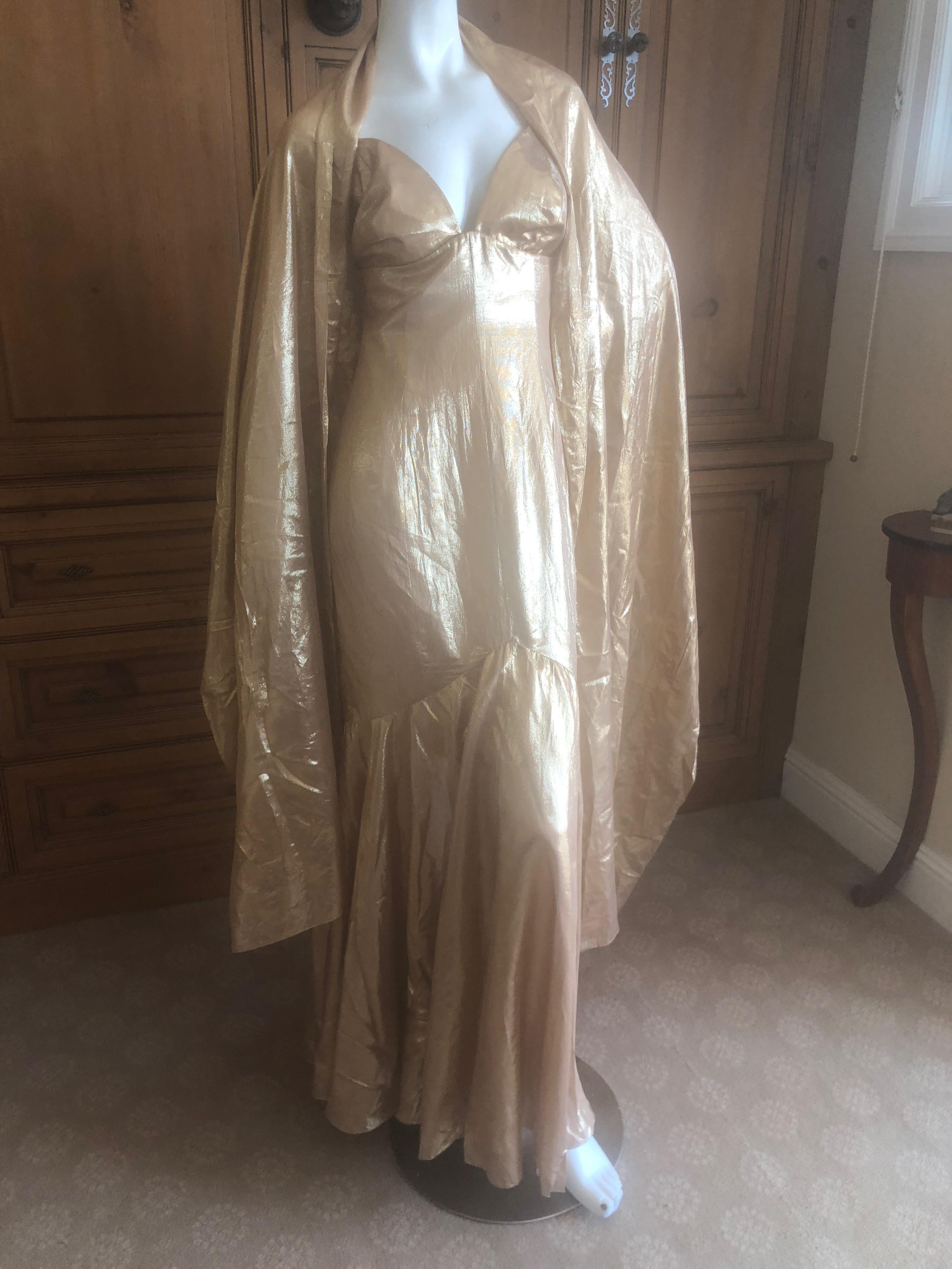 Jacques Fath Vintage Golden Halter Evening Dress with Shawl.
So fabulous. Gossamer thin golden silk fabric, so chic!
Simply Stunning. Please use the zoom feature to see al the details.
Size 40
Bust 34