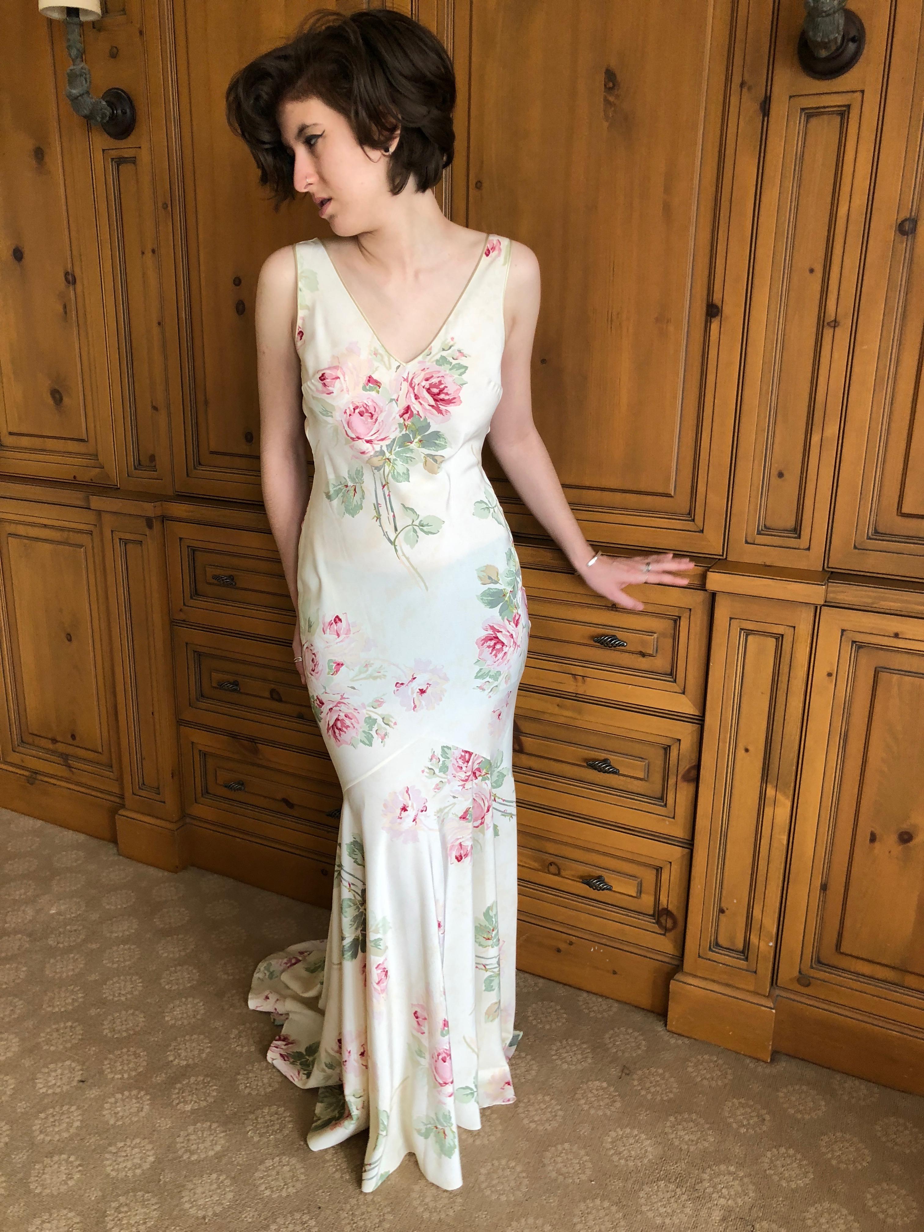 John Galliano 1990's Bias Cut Floral Dress with Draped Back and Train.
This would make an exquisite wedding dress.
So much prettier in person.
Appx Size 38-40, there is no fabric or sizing tag.
Bust 40