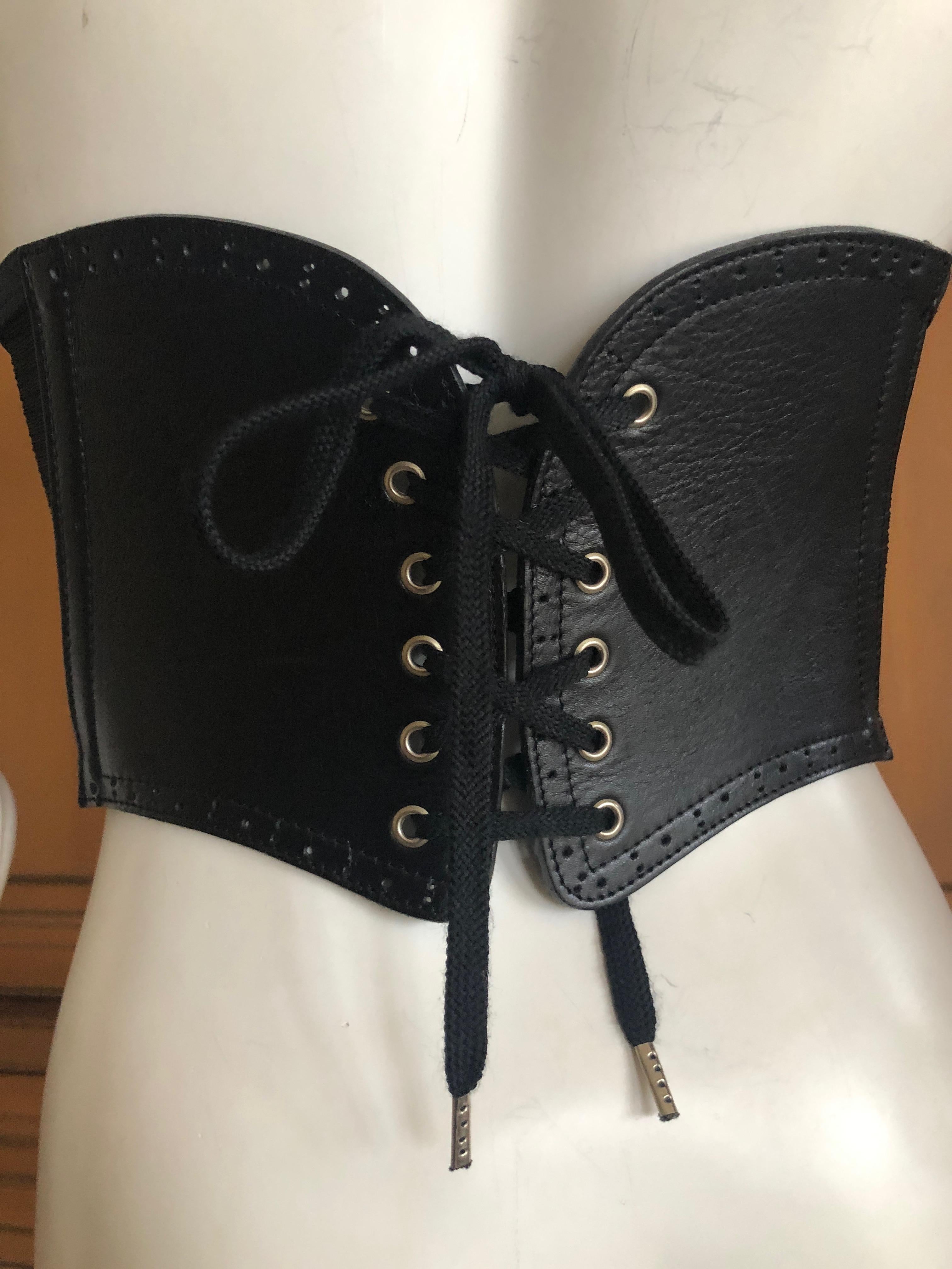 Jean Paul Gaultier Black Leather Harness with Corset Laced Details.
Unisex, marked size 42
Will fit 23
