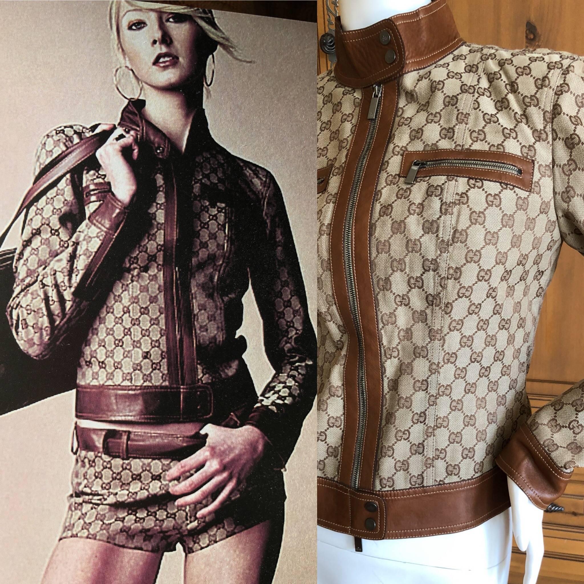 Gucci by Tom Ford Leather Monogram Jacket 2002 
As featured in the Tom Ford Book Full Page.
Leather interior, monogram GG Canvas outer.
Size 42
Bust 36