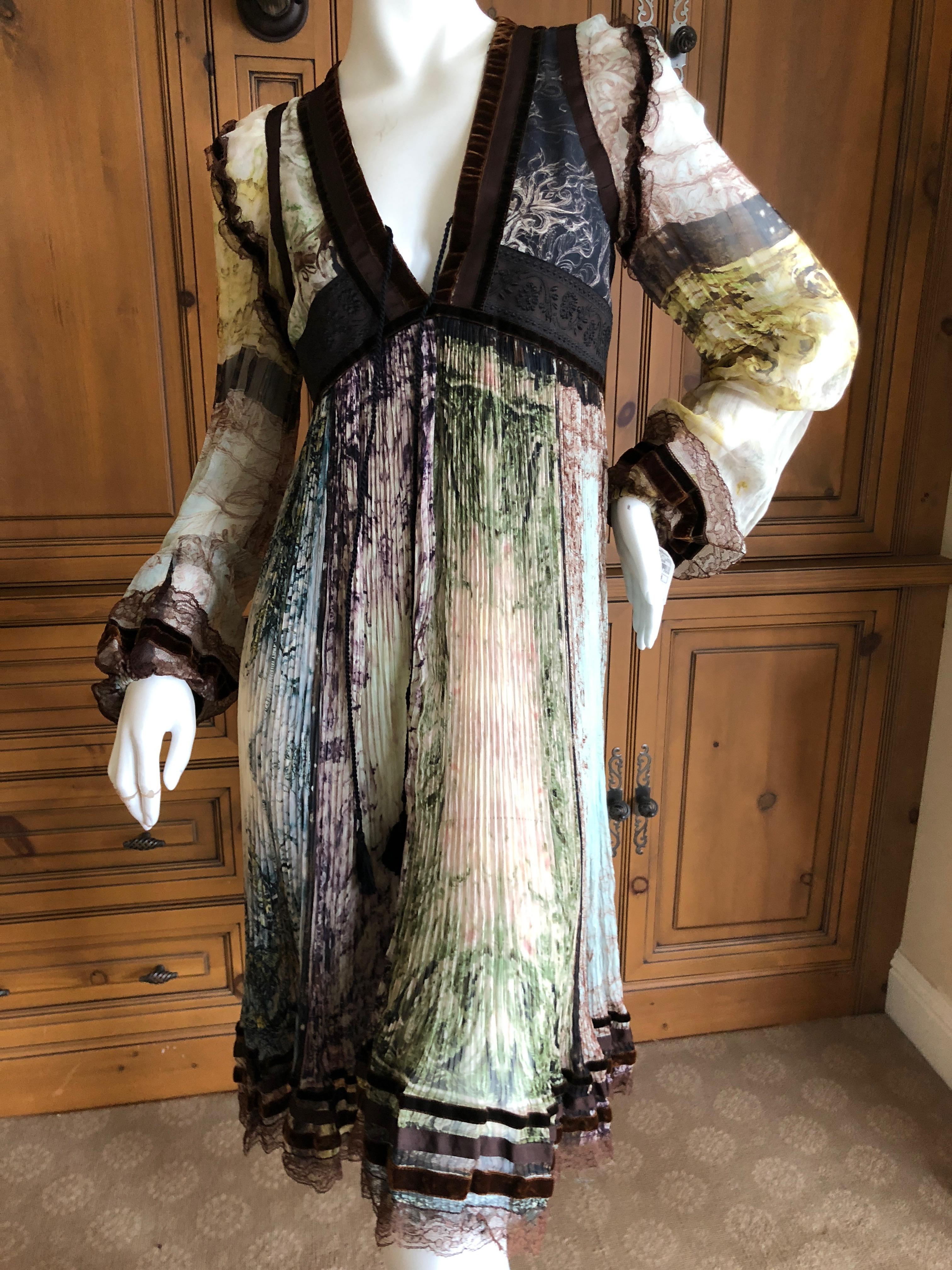 Jean Paul Gaultier Femme Vintage Plisse Pleated Empire Dress with Velvet Trim.
New with tags from Neiman Marcus, retail was $3540

Size 8 US 42 French

Bust 36