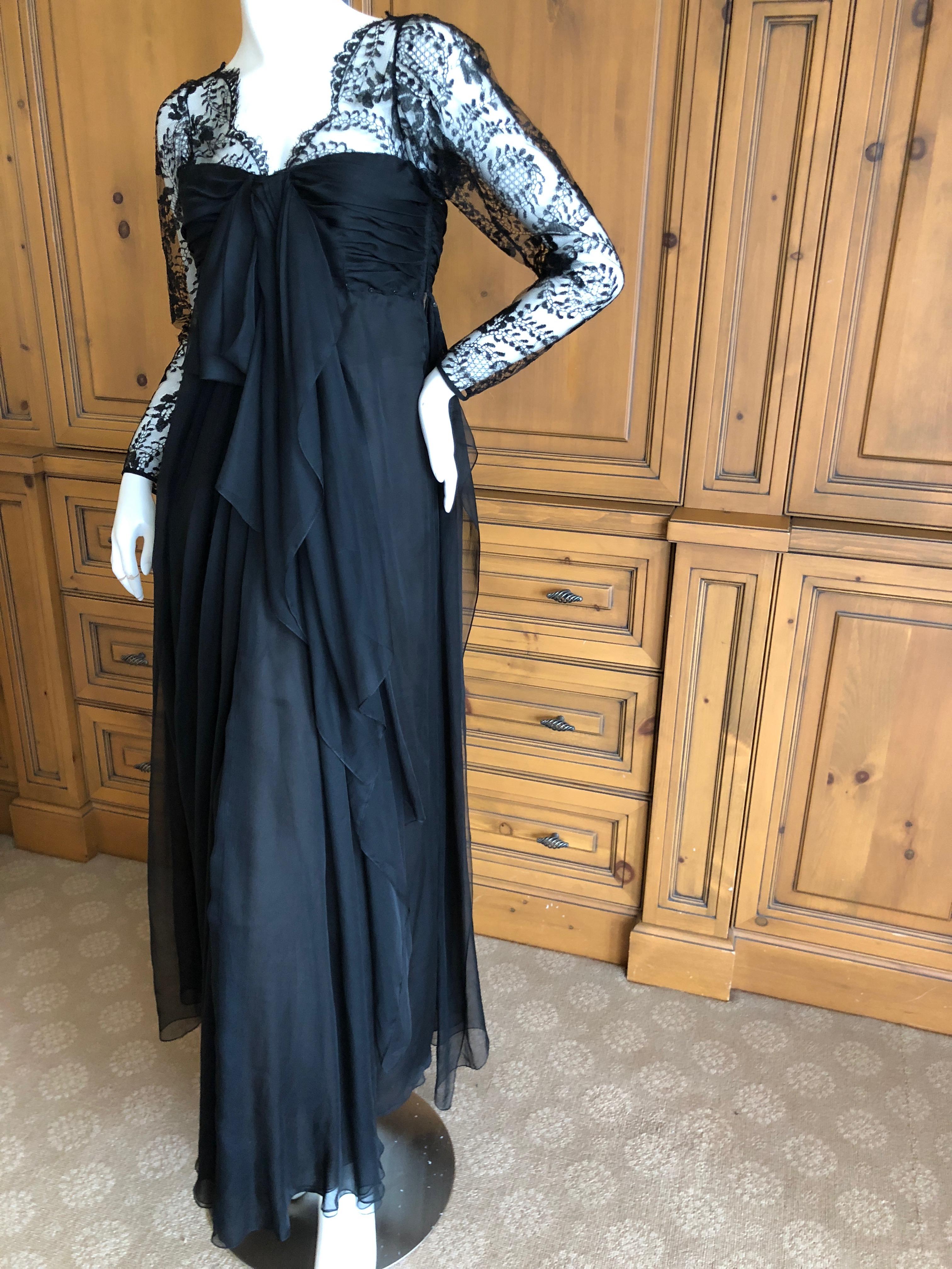 
Yves Saint Laurent Numbered Haute Couture Black Lace Evening Dress.
Draped flou soft tailored tea length evening dress from Yves Saint Laurent Haute Couture circa 1972.
Simply exquisite.
Bust 34