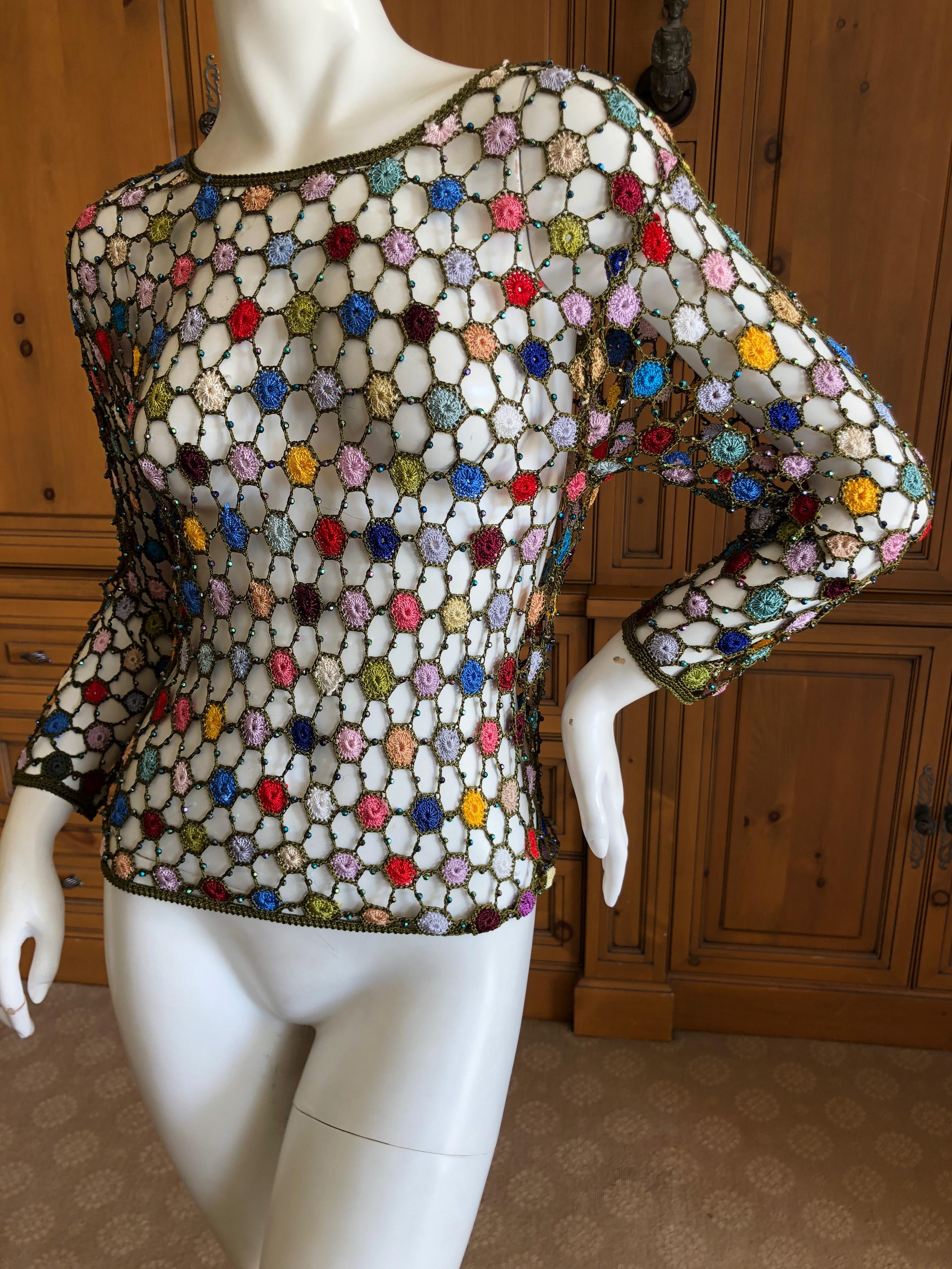 Gianni Versace Couture Vintage Crystal Bead Crochet Flower Sheer Long Sleeve Top.
Late eighties.
This is an amazing piece of handcrafted vintage treasure,  please use zoom feature to see details.
There is no size label Est .size 36
Bust 36