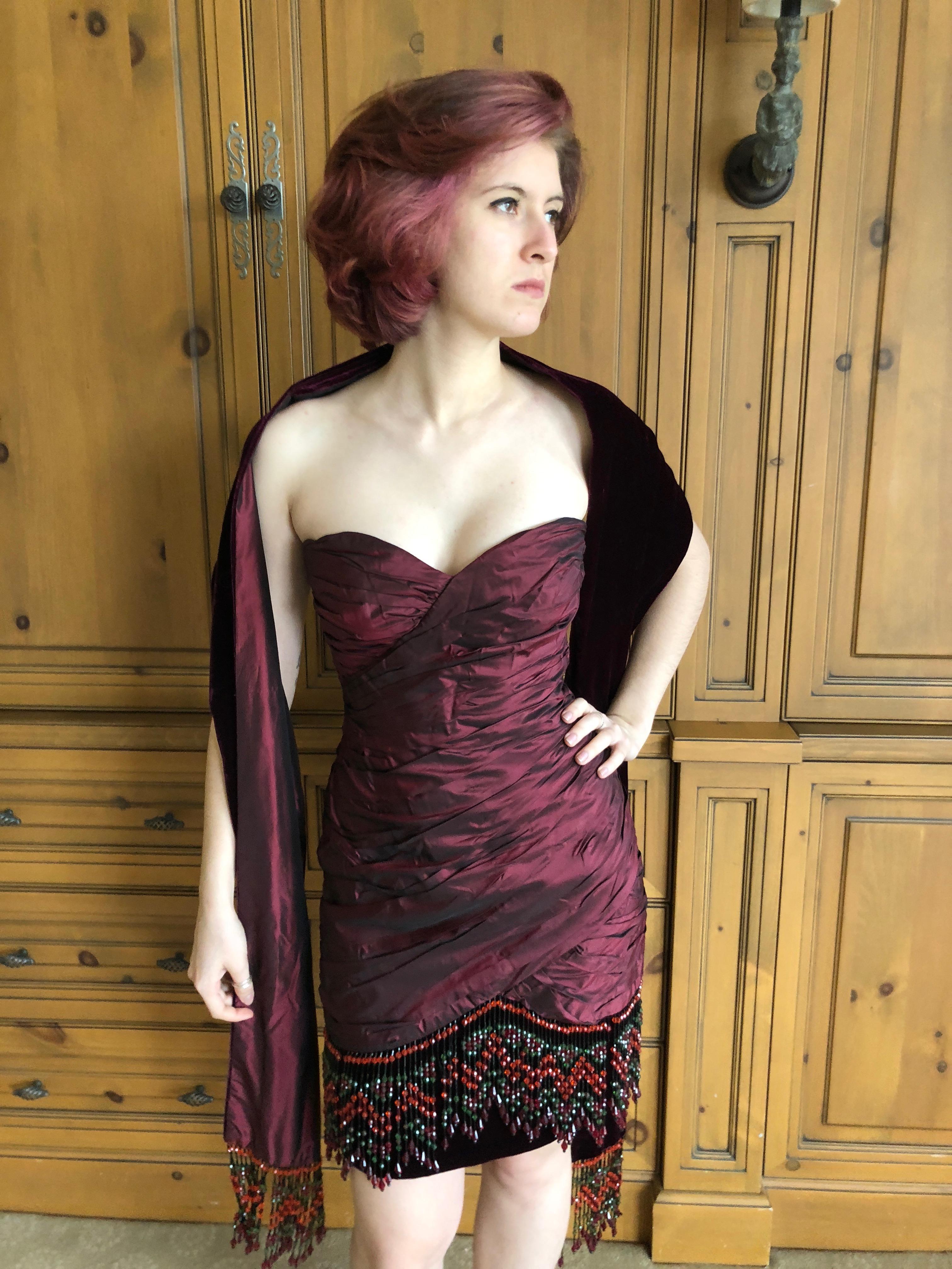 Bellville Sassoon Burgundy Silk Cocktail Dress w Beaded Fringe & Matching Shawl
This is hard to capture in a photo.
Size 8
Bust 35