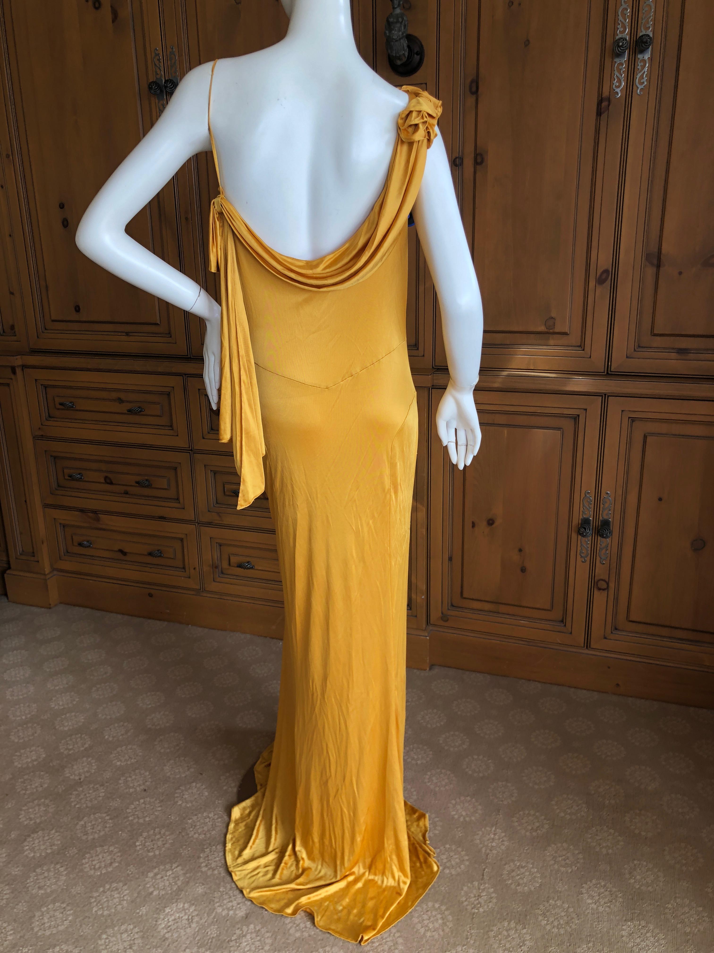 Exquisite John Galliano Spring 2000 Marigold Draped Bias Cut Evening Dress w Floral Trim
Spring Summer 2000.
Difficult to photograph, this is lovely.
Size 46
Bust 44'
Waist 32