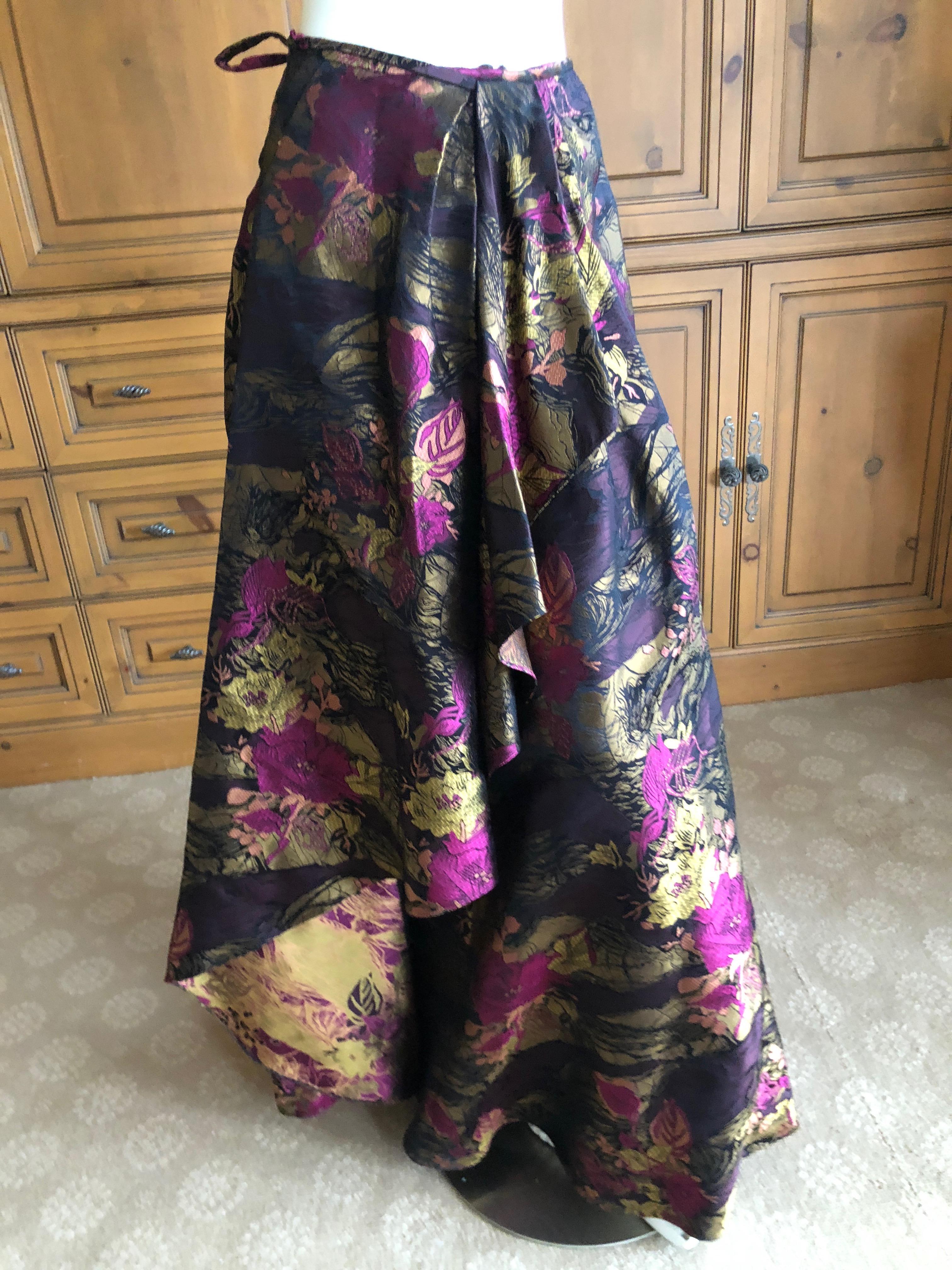 Christian Lacroix Vintage Floral Brocade Three Piece Evening Ensemble.

This is so pretty, featuring a wrap style skirt, a bustier and very large wrap, which is lined in pink floral lace,
Skirt marked Size 38, the bustier is marked size 40
Bust