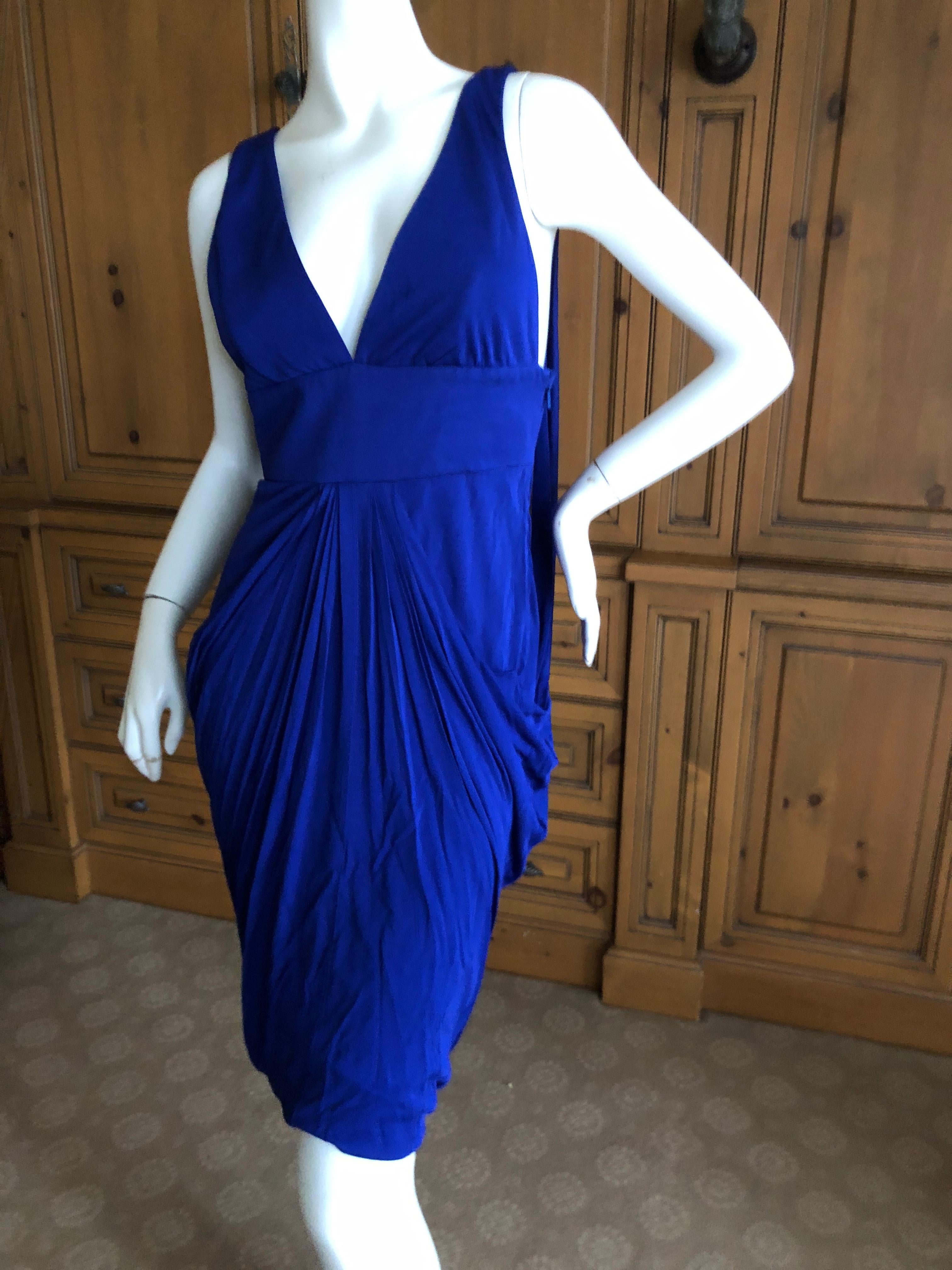 Versace Vintage Purple Pleated Jersey Low Cut Cocktail Dress with Low Back
Supersexy on, this is a wonderful Versace
Size 40
Bust 34