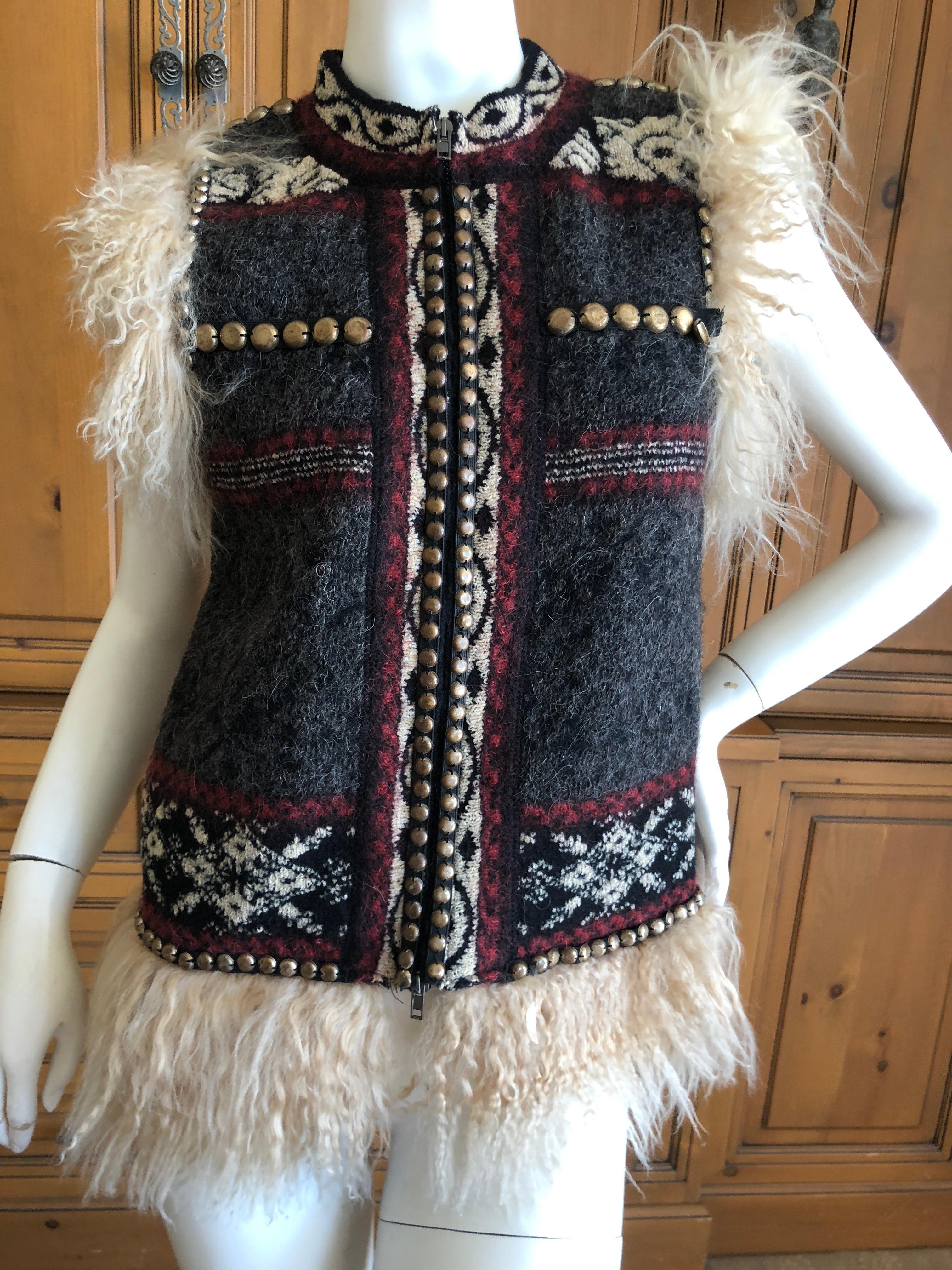 Terrific Vintage Jean Paul Gaultier Maille Femme Studded Boho Ethnic Vest with Curly Lamb Trim.
Size small but seems to run large
Bust 34