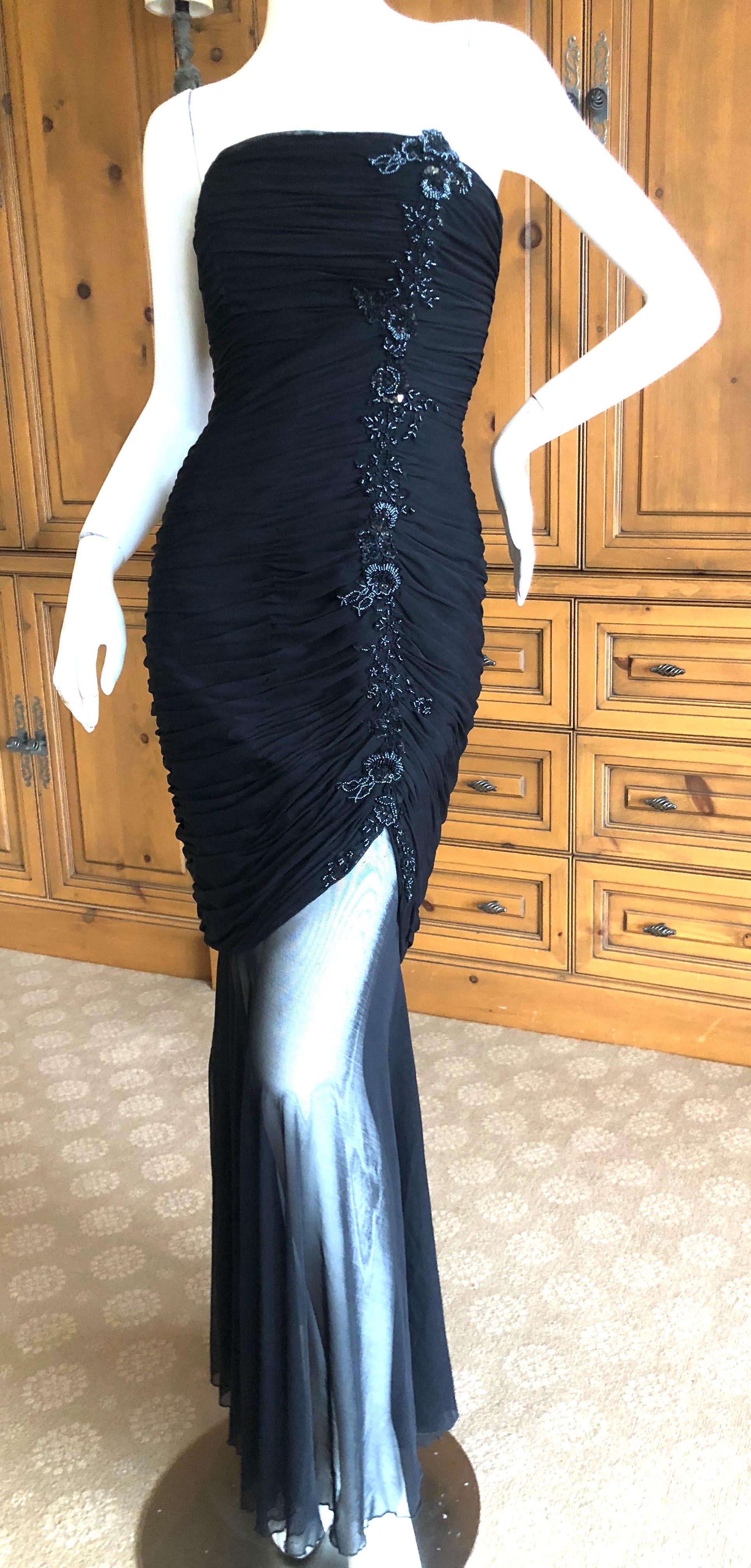Vicky Tiel Couture Paris for Neiman Marcus Shirred Strapless Black Beaded Evening Dress.
Exquisite black dress with beading down the side front , sheer at the bottom.
The witty quote was 