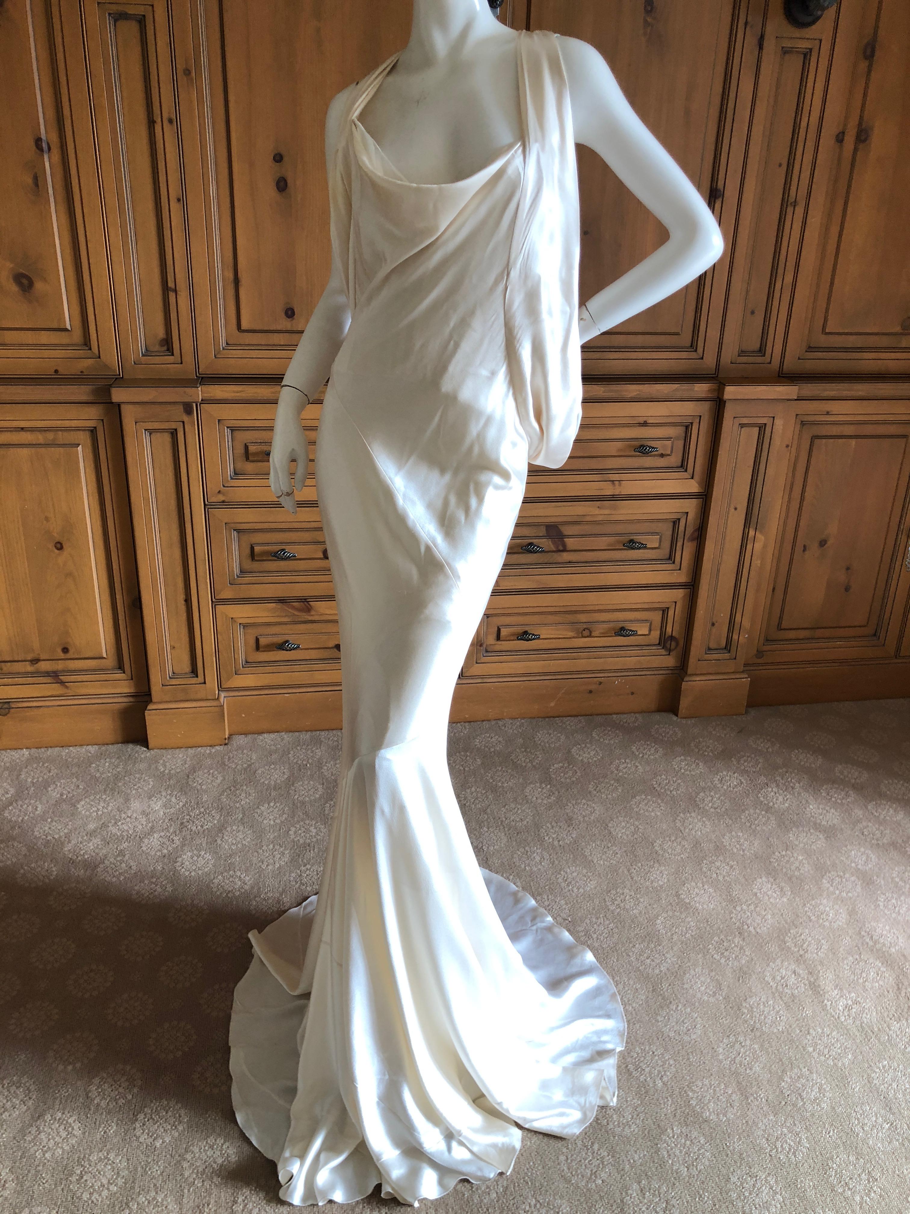  Alexander McQueen Daring Ivory Duchesse Silk Satin Evening or Wedding Dress
This is so beautiful, with a full inner corset that is exposed.
Size 44 seems to be cut quite generously.
 Bust 38