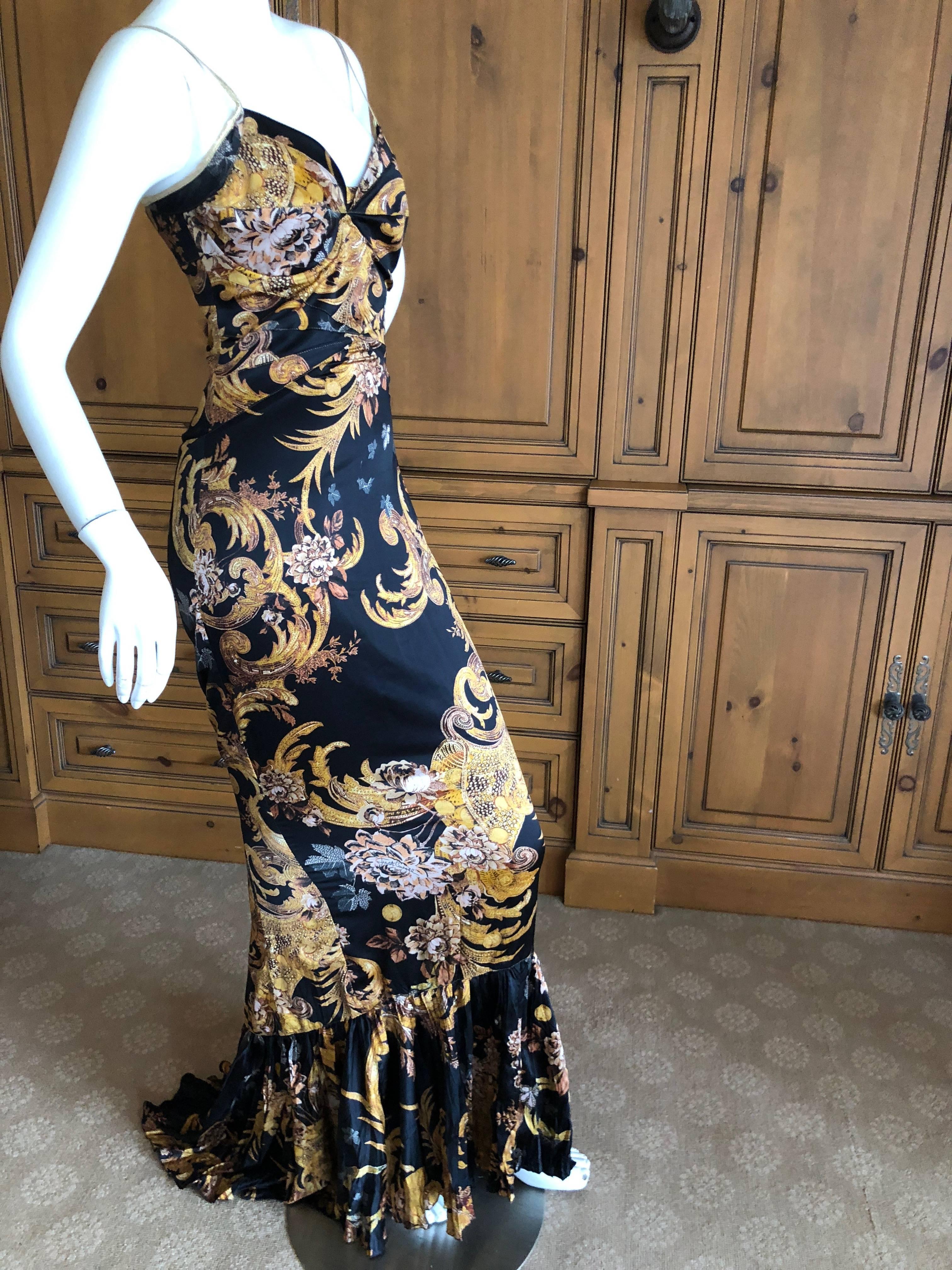 Roberto Cavalli Elegant Fishtail Mermaid Back Evening Dress.
This is so pretty, with a rich gold print, and mermaid fishtail back.
Size 38, but runs small.
Bust 34