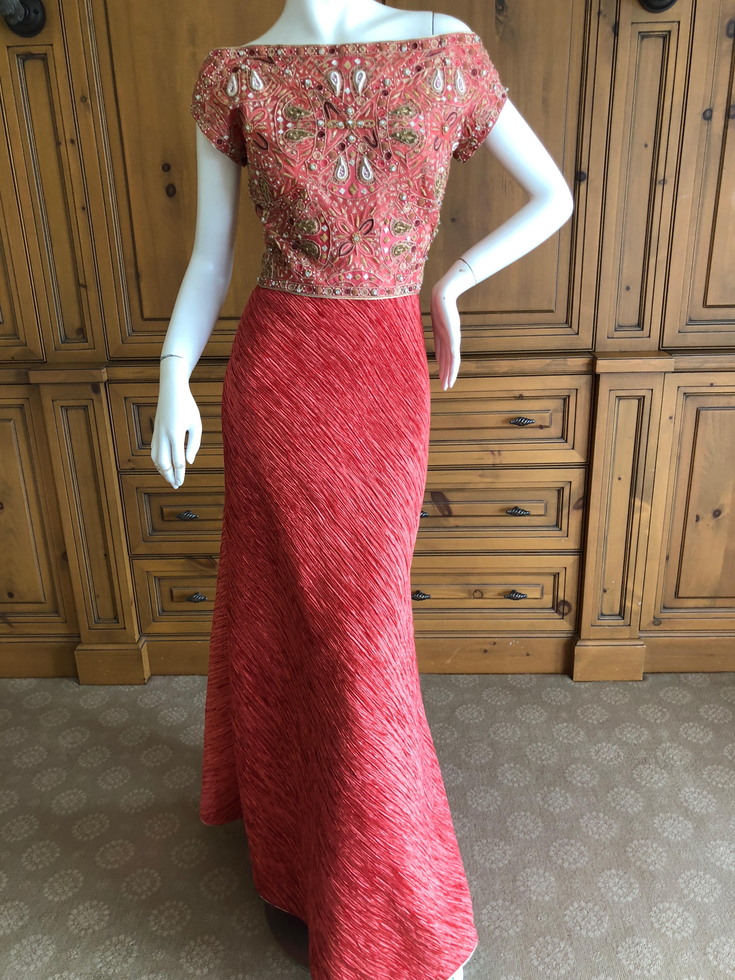 Mary McFadden Couture 1970's Rose Red Plisse Pleated Embellished Evening Dress
There is a slight tear to the sheer silk on the back, please see last two photos, could be repaired , but does need a bit of TLC.
Size 6
Bust 34