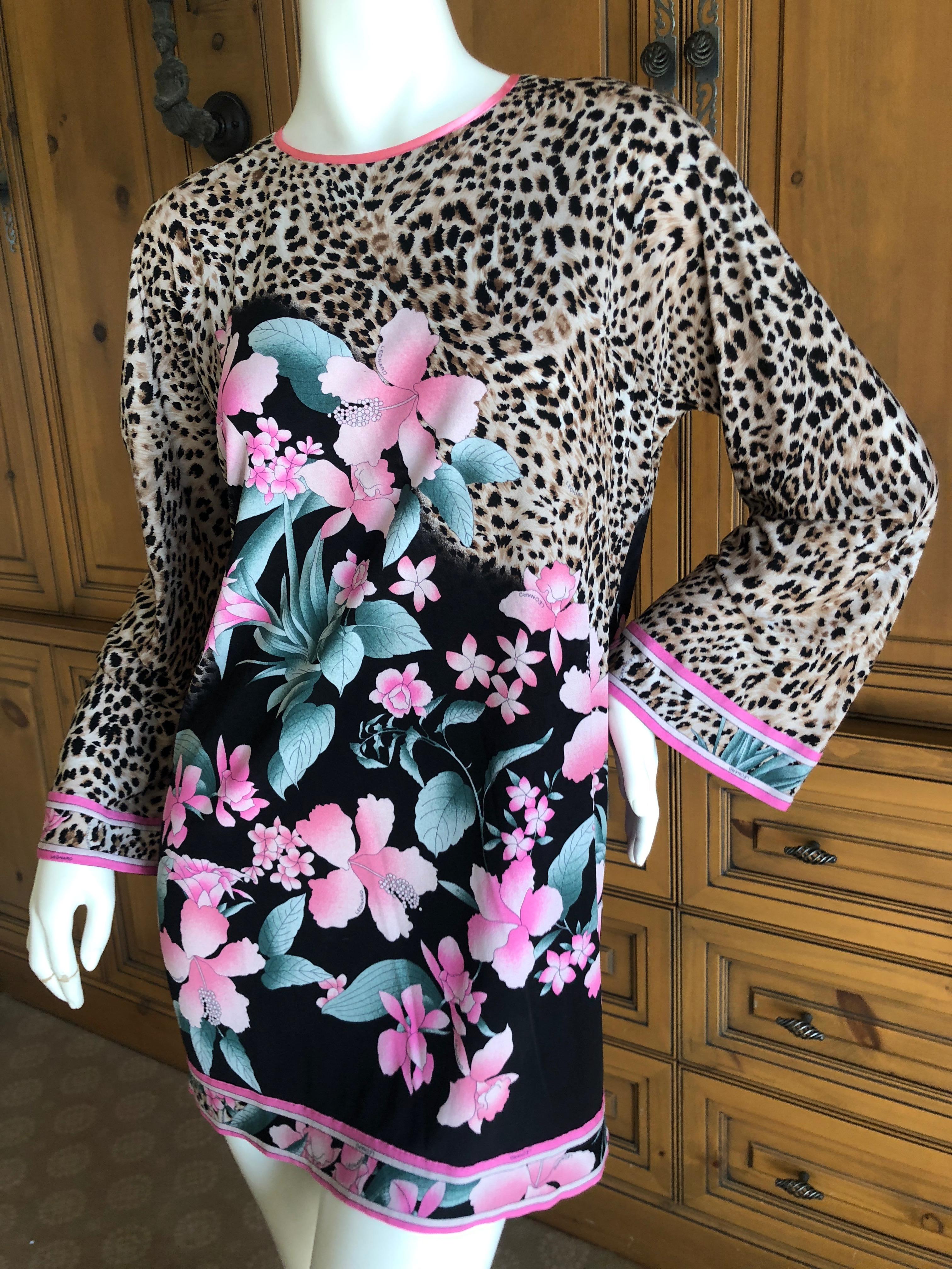 Leonard Paris 1970's Pure Silk Jersey Floral and Leopard Print Mini Dress.
Leonard , Paris was a contemporary of Pucci, using silk jersey printed in their signature florals, Leonard was as expensive, if not more, than Pucci.
Size 38 but runs