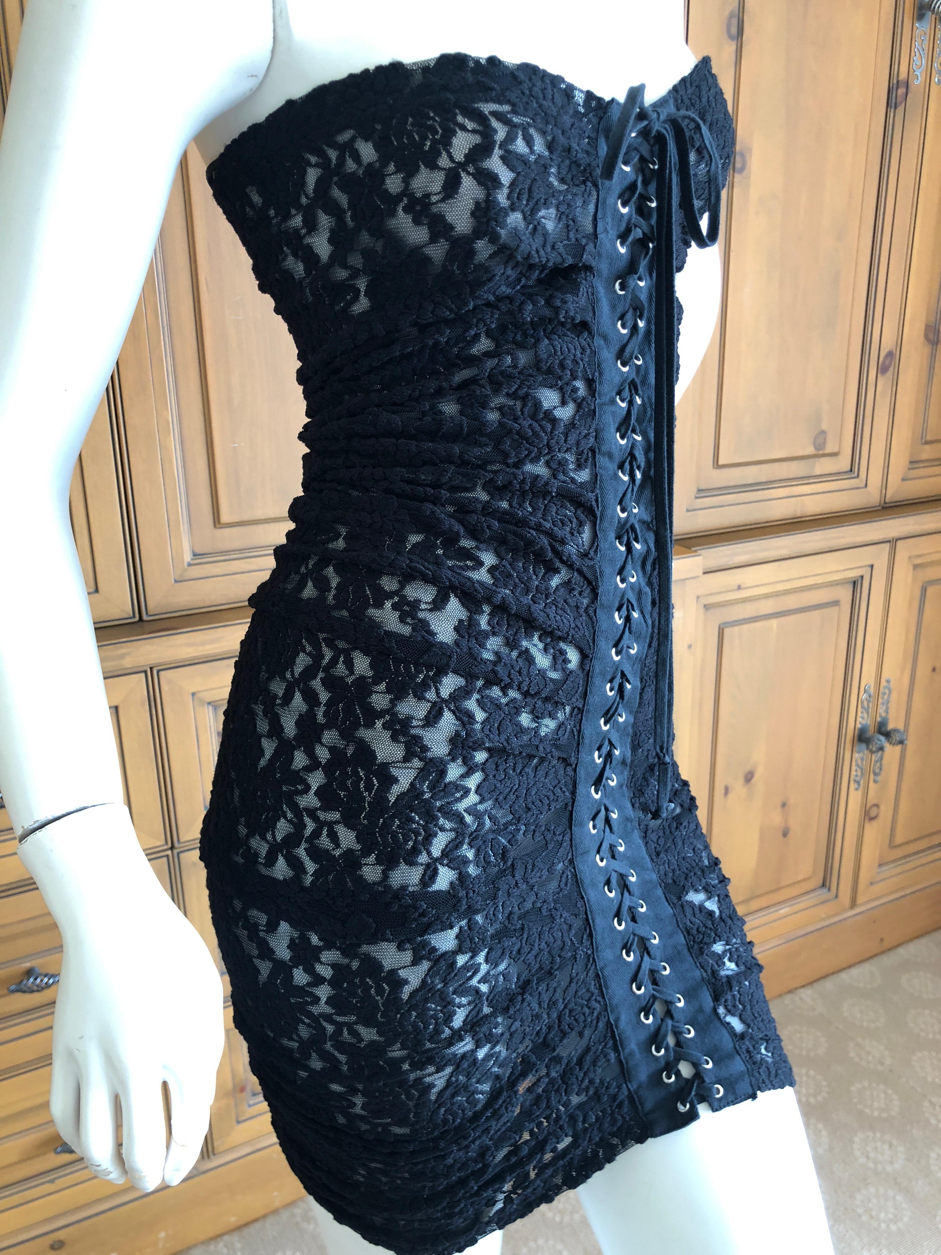 D&G Dolce & Gabbana Sheer Black Lace Strapless Cocktail Dress w Lace Up Details
Size 42, but runs small
Bust 34