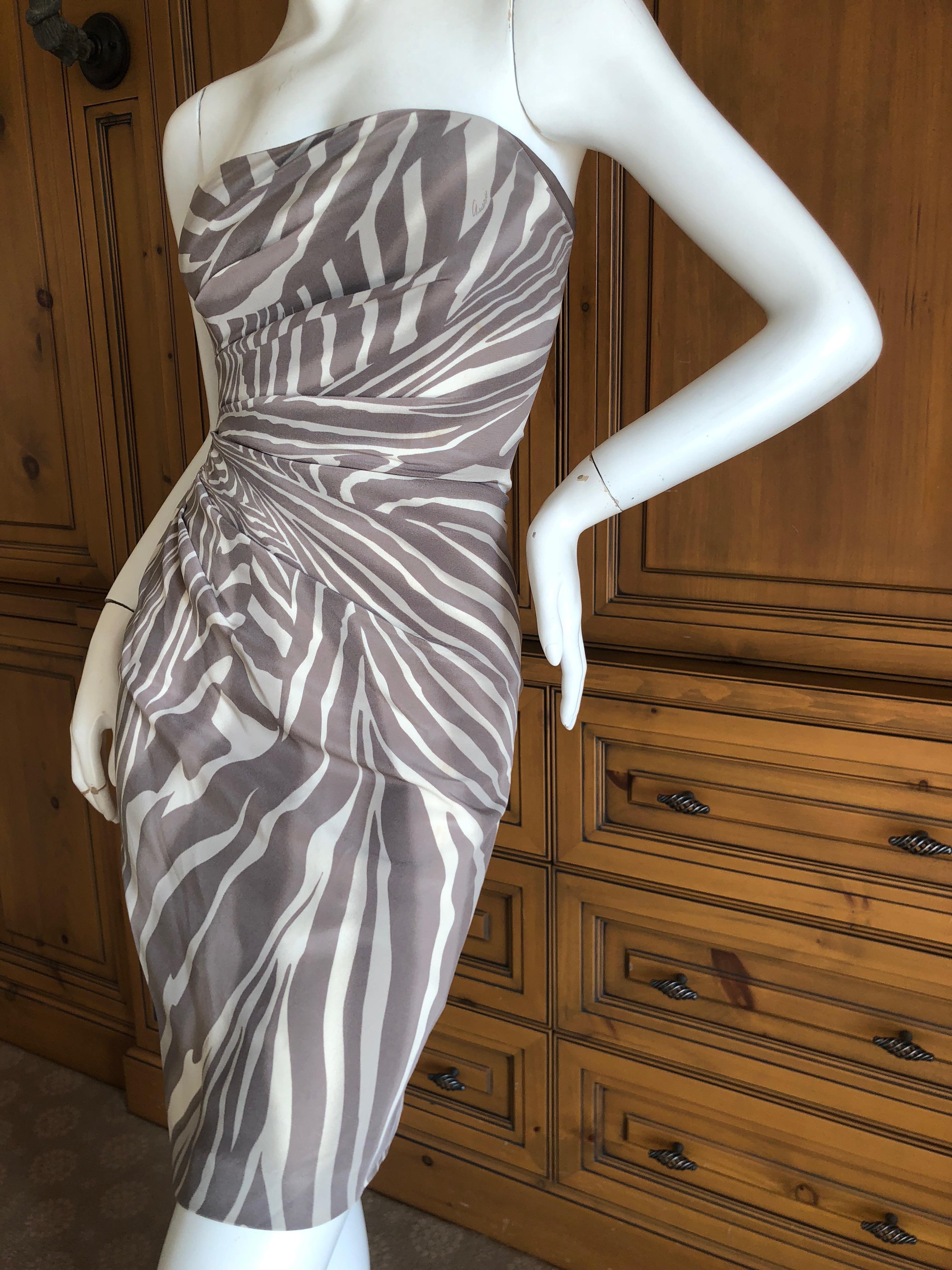 Gucci by Tom Ford Silk Strapless Zebra Pattern Mini Dress
Lots of stretch 
 Size 38
Bust 34