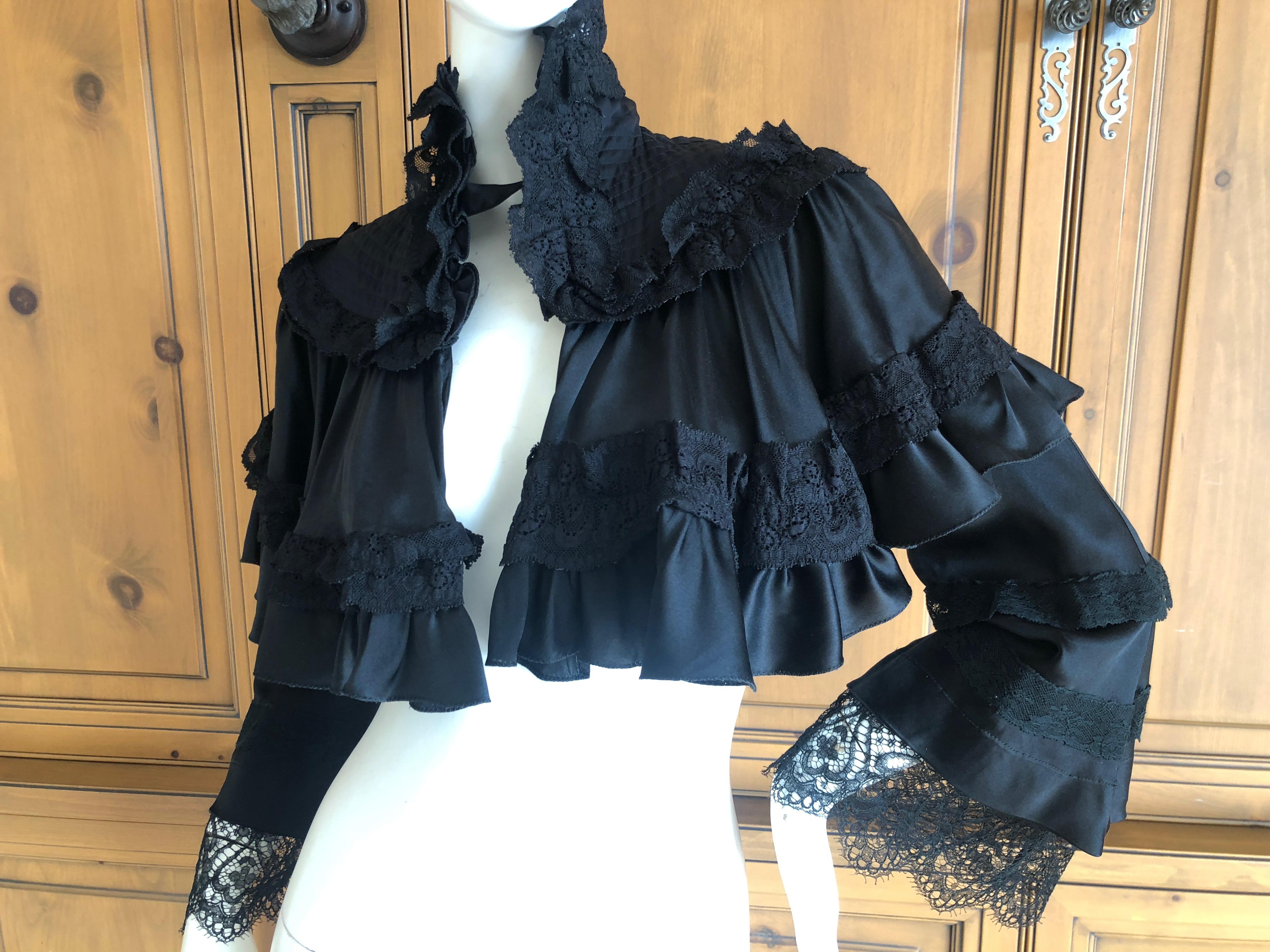 Roberto Cavalli for Just Cavalli Vintage Black Silk Victorian Style Cape Jacket.
This is so pretty, please use zoom feature to see details
Size 38
Bust 36