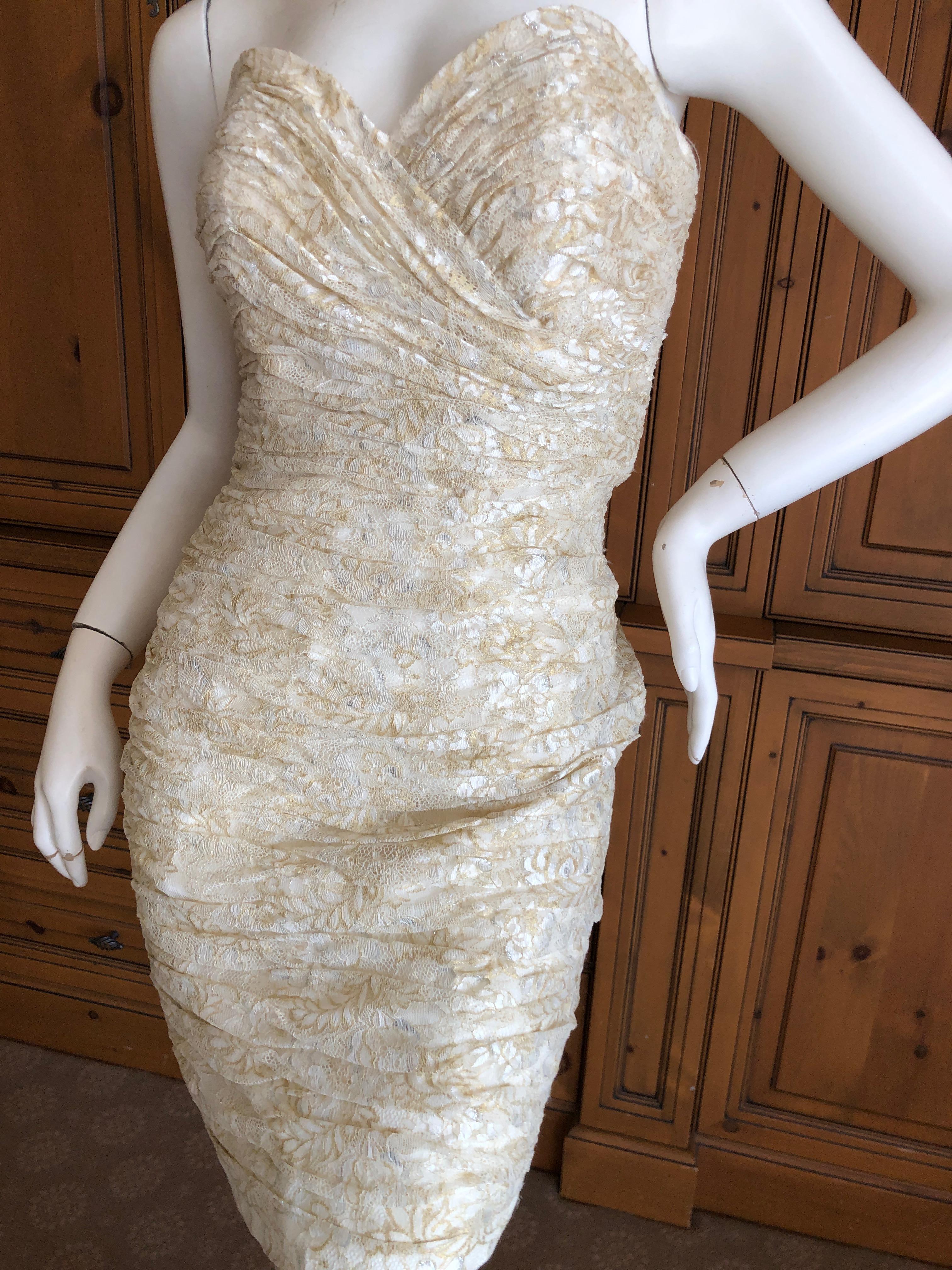 Vicky Tiel Vintage 80's Gold and Ivory Lace Strapless Cocktail Dress
The witty quote was 