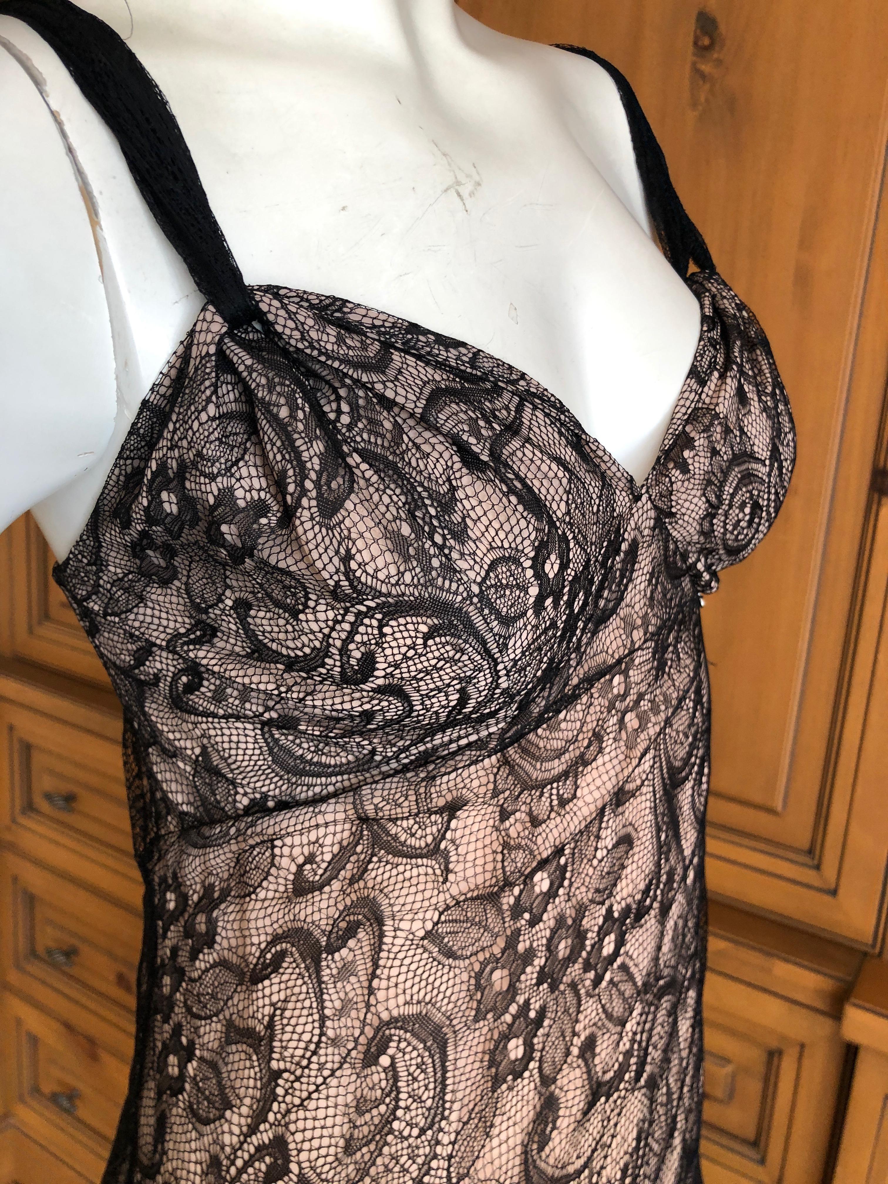 Elegant John Galliano Black Lace Evening Dress with Pale Pink Under Lining.
Size 42
Bust 38