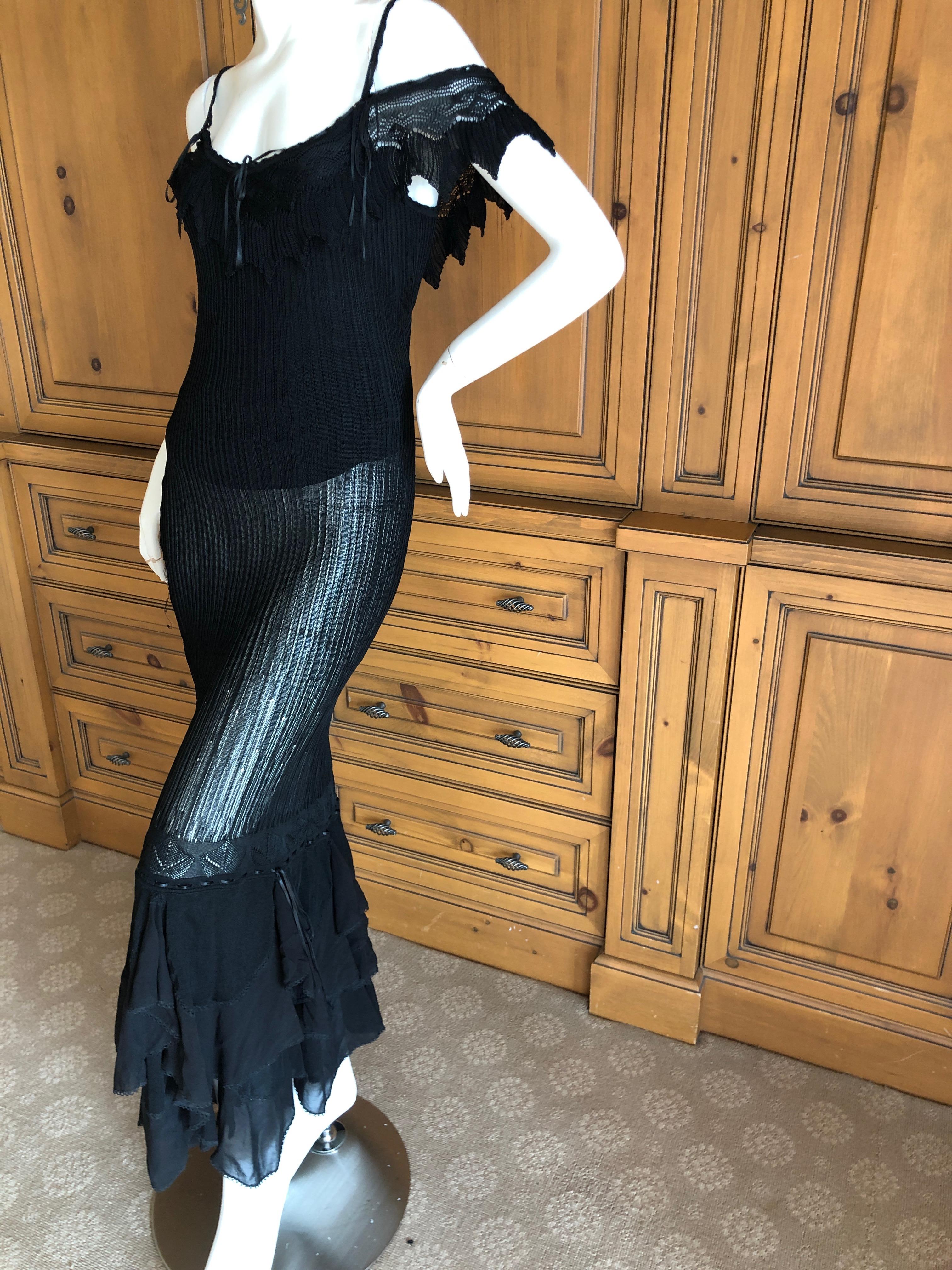  John Galliano Goth Black Semi Sheer Vintage  Ruffled Evening Dress.
Fully lined, I also show it with the lining removed a bit, often my customers wear these sheer with fancy under garments.
N0 size tag App Size 36- 38
 Bust 36