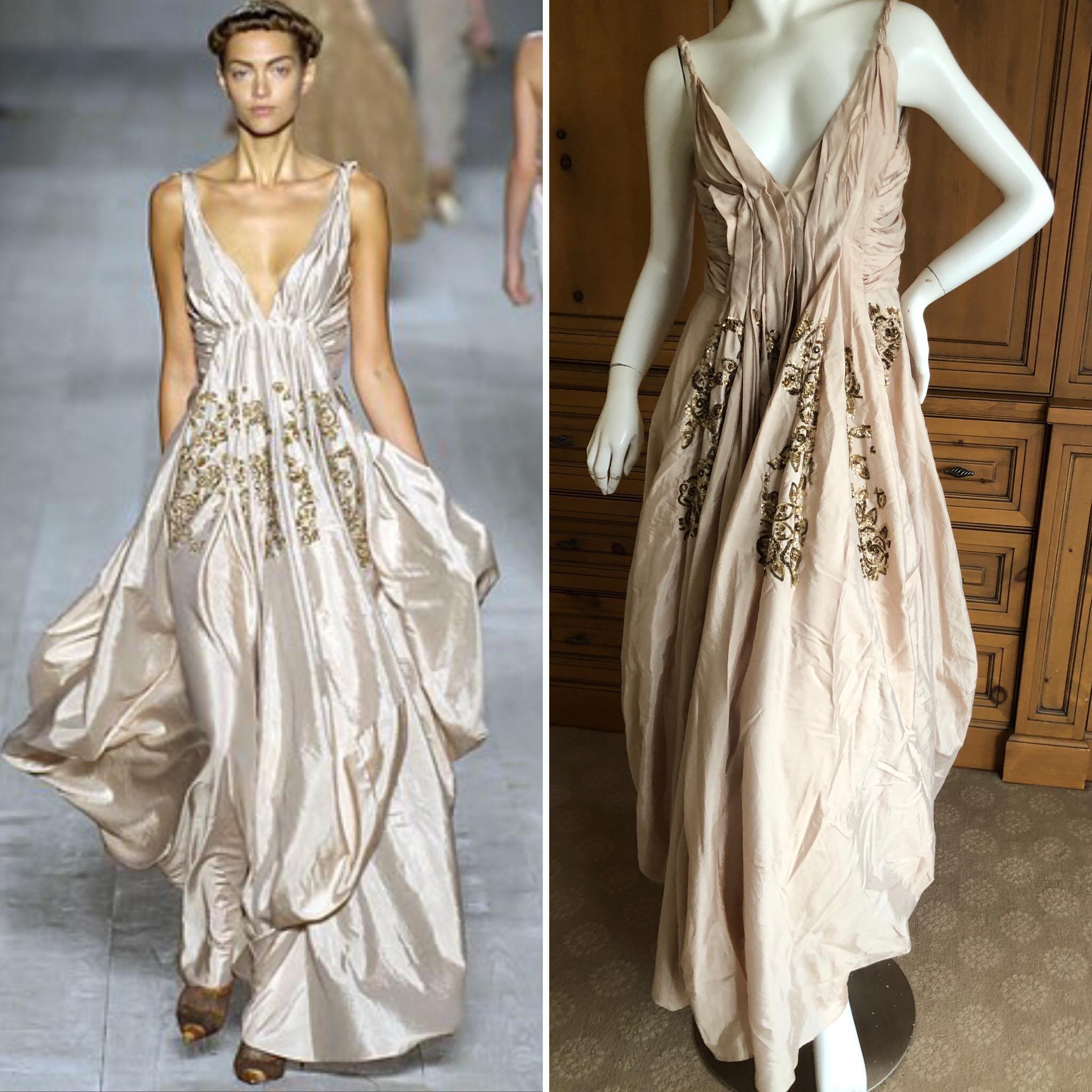  Christian Dior by John Galliano Evening Dress with Gold Sequin Floral Details from Spring 2007
This is so pretty, with miles of silk in the skirt.
Size 40 French 8 US
 Bust 36