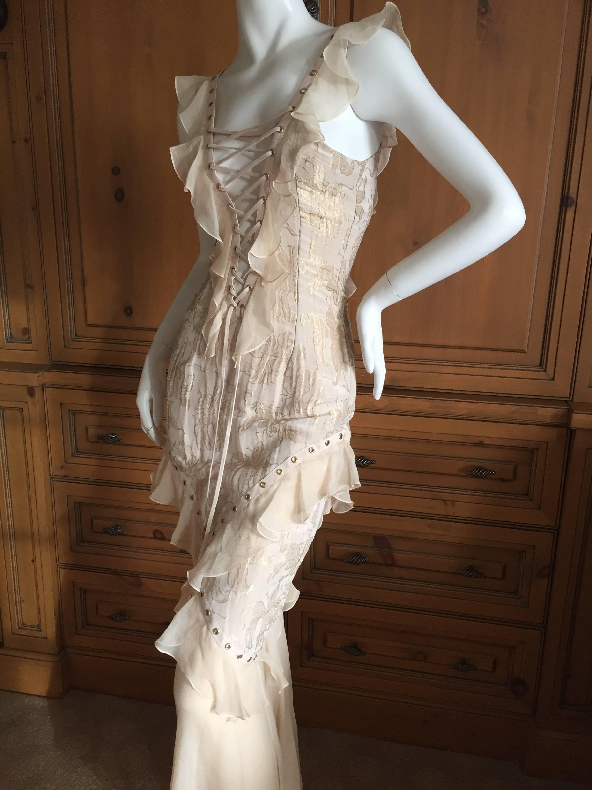 Christian Dior by John Galliano romantic silk long evening dress .
This is such a pretty piece, with grommet details in the straps and corset lacing up the low plunging neckline.
Pure Galliano, pure delight.
This is marked size 36, but seems to run