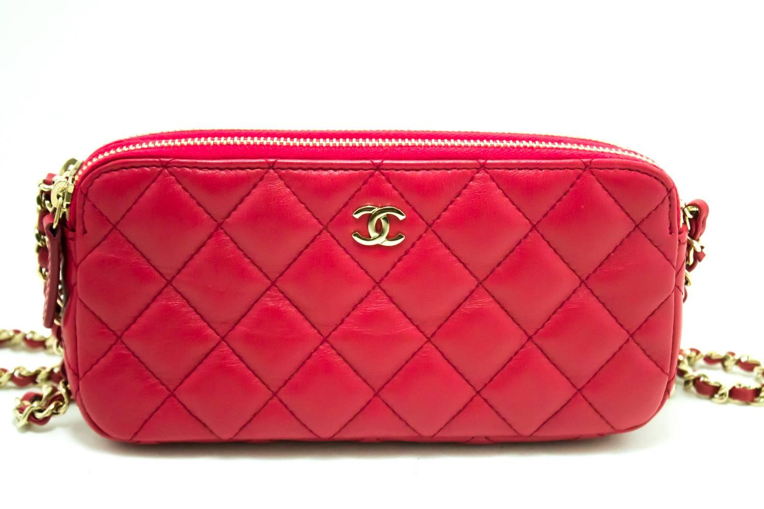 An authentic CHANEL Red Wallet On Chain WOC Double Zip Chain Shoulder Bag The outside material is made of black Lambskin.
Conditions & Ratings
Outside material: Lambskin
Color: Red
Closure: Zipper
Hardware and chain: Gold-tone
Made in Italy
Serial
