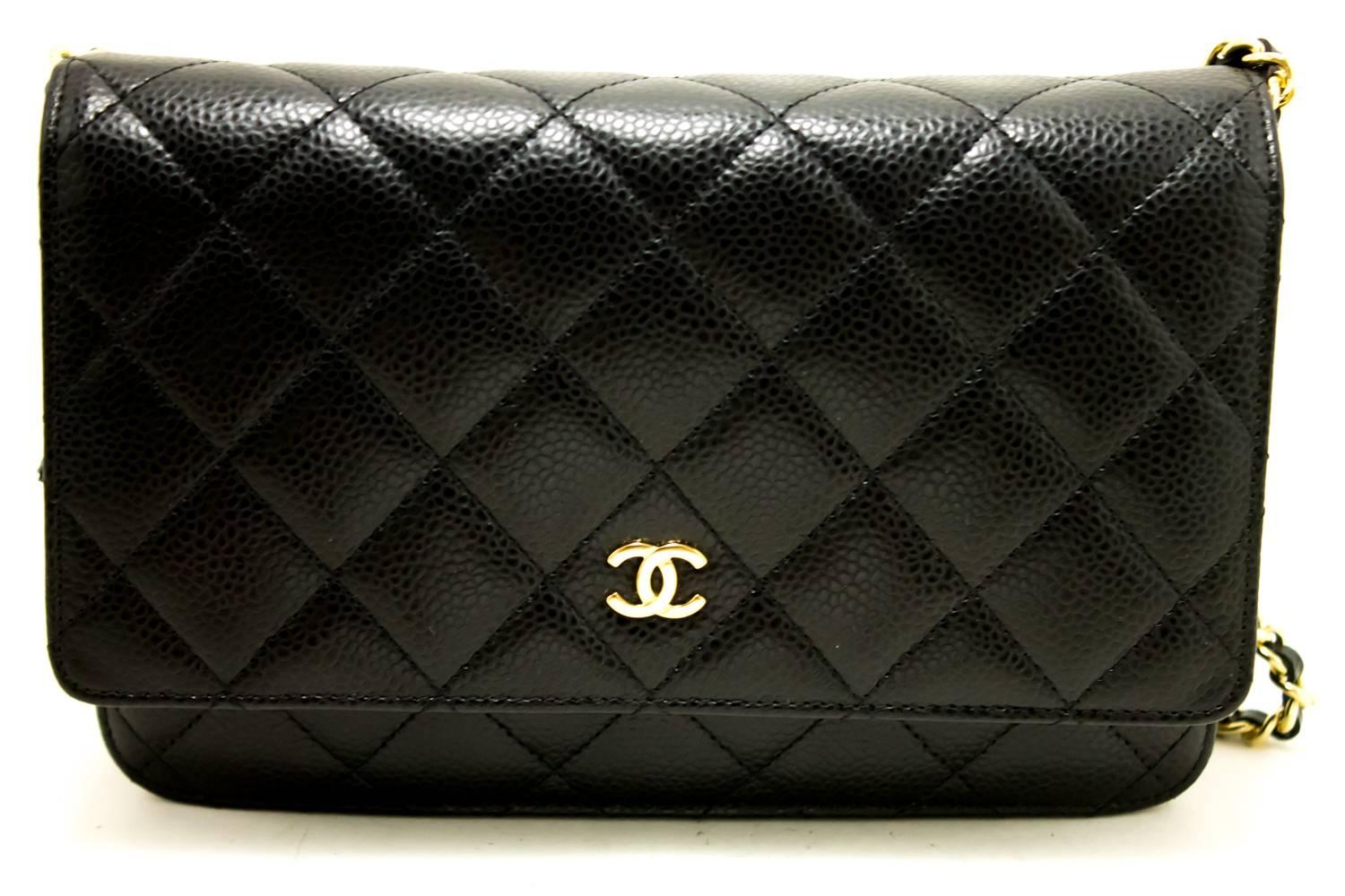 An authentic CHANEL Caviar Wallet On Chain WOC Black Shoulder Bag Crossbody The outside material is Caviar leather.
Conditions & Ratings
Outside material: Caviar leather
Color: Black
Closure: Snap
Hardware and chain: Gold-tone
Made in France
Serial