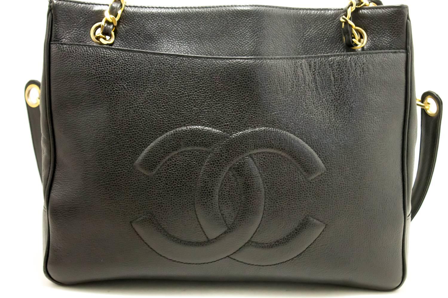 An authentic CHANEL Caviar Large Chain Shoulder Bag Black CC Leather Gold The outside material is Caviar leather.
Conditions & Ratings
Outside material: Caviar leather
Color: Black
Closure: Snap
Hardware and chain: Gold-tone
Serial sticker: