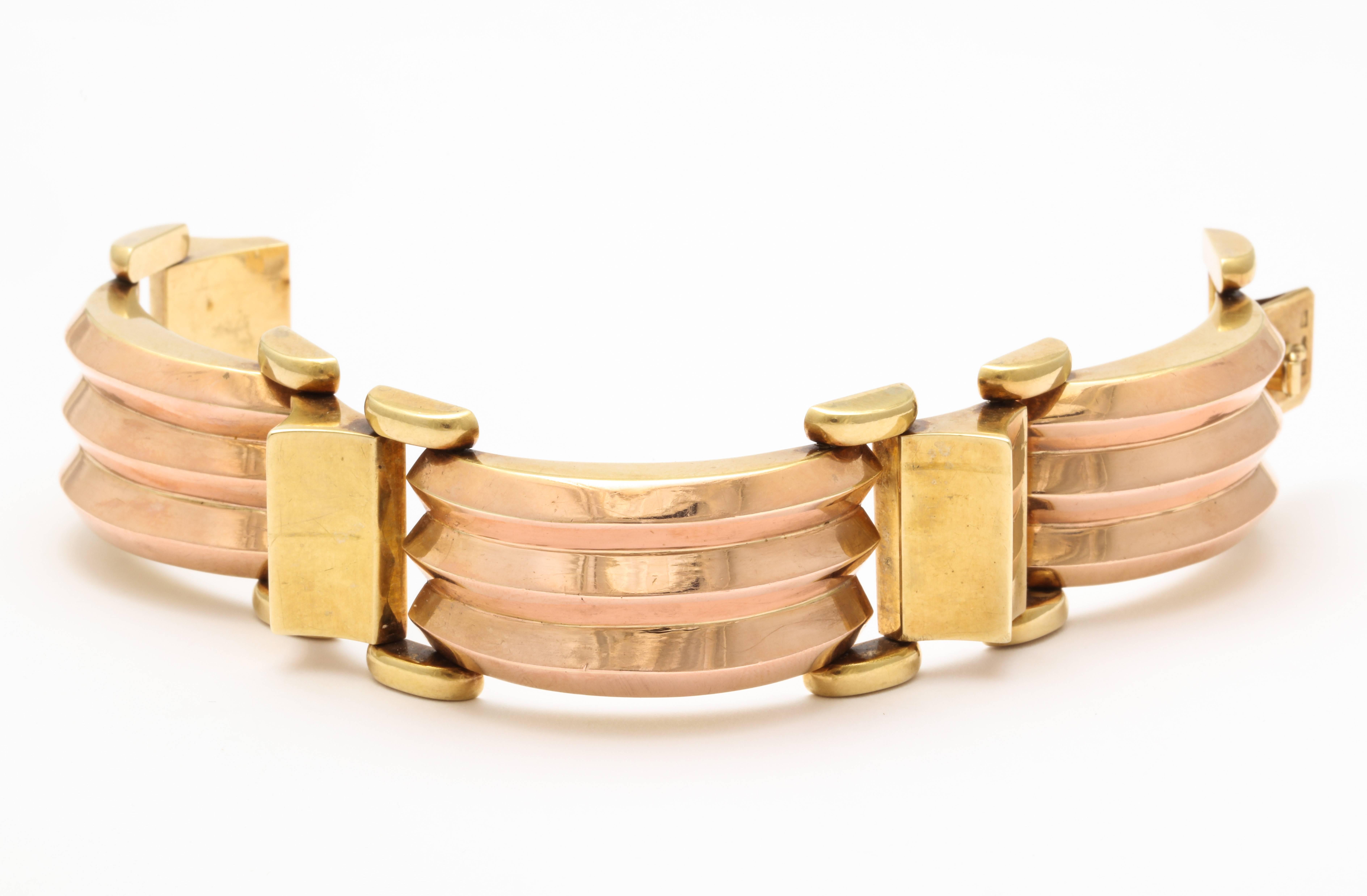 A stylish two color 15 kt gold bracelet in pink and yellow gold