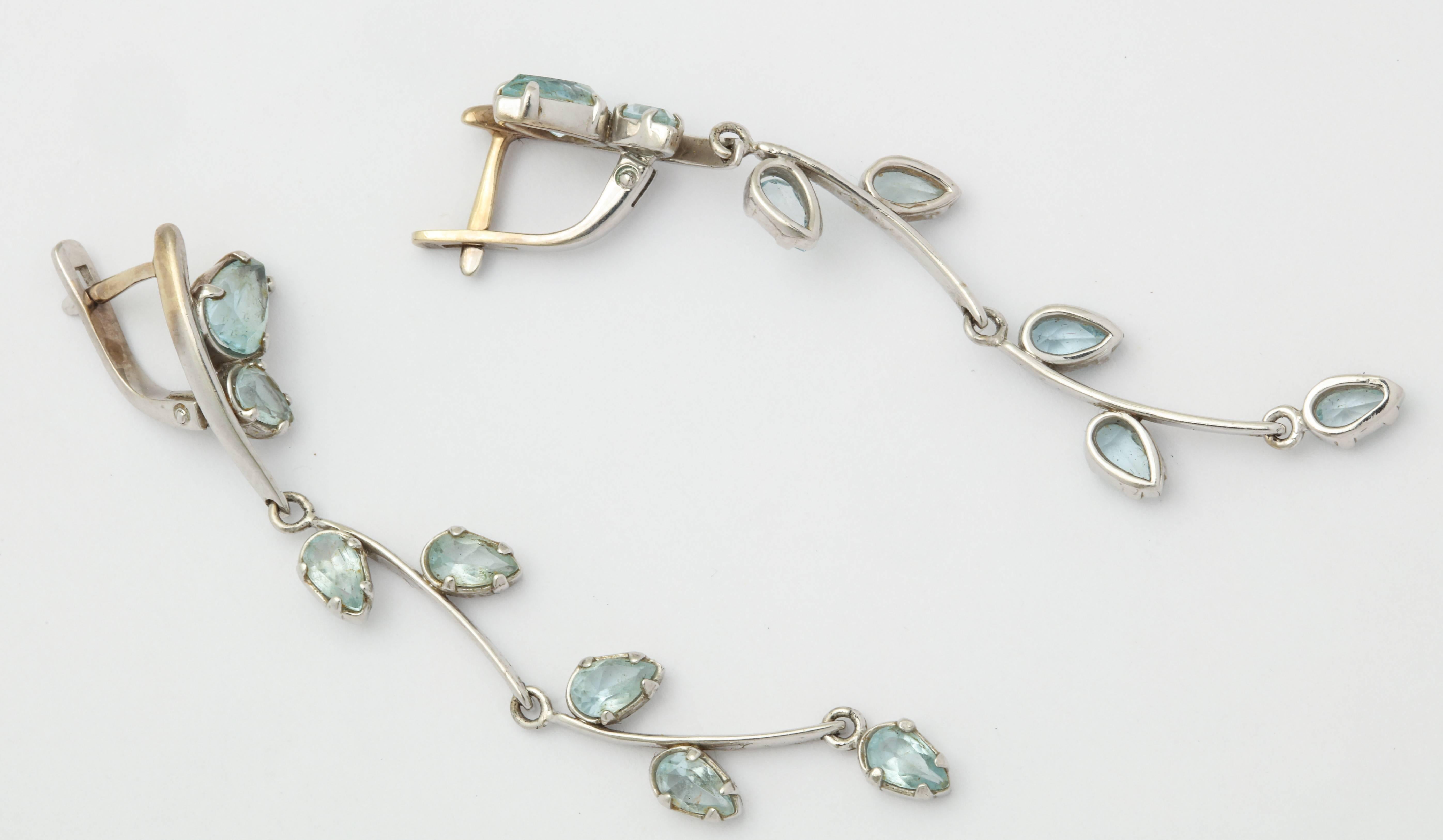 Pear Cut Aquamarine and White Gold Drop Earrings.