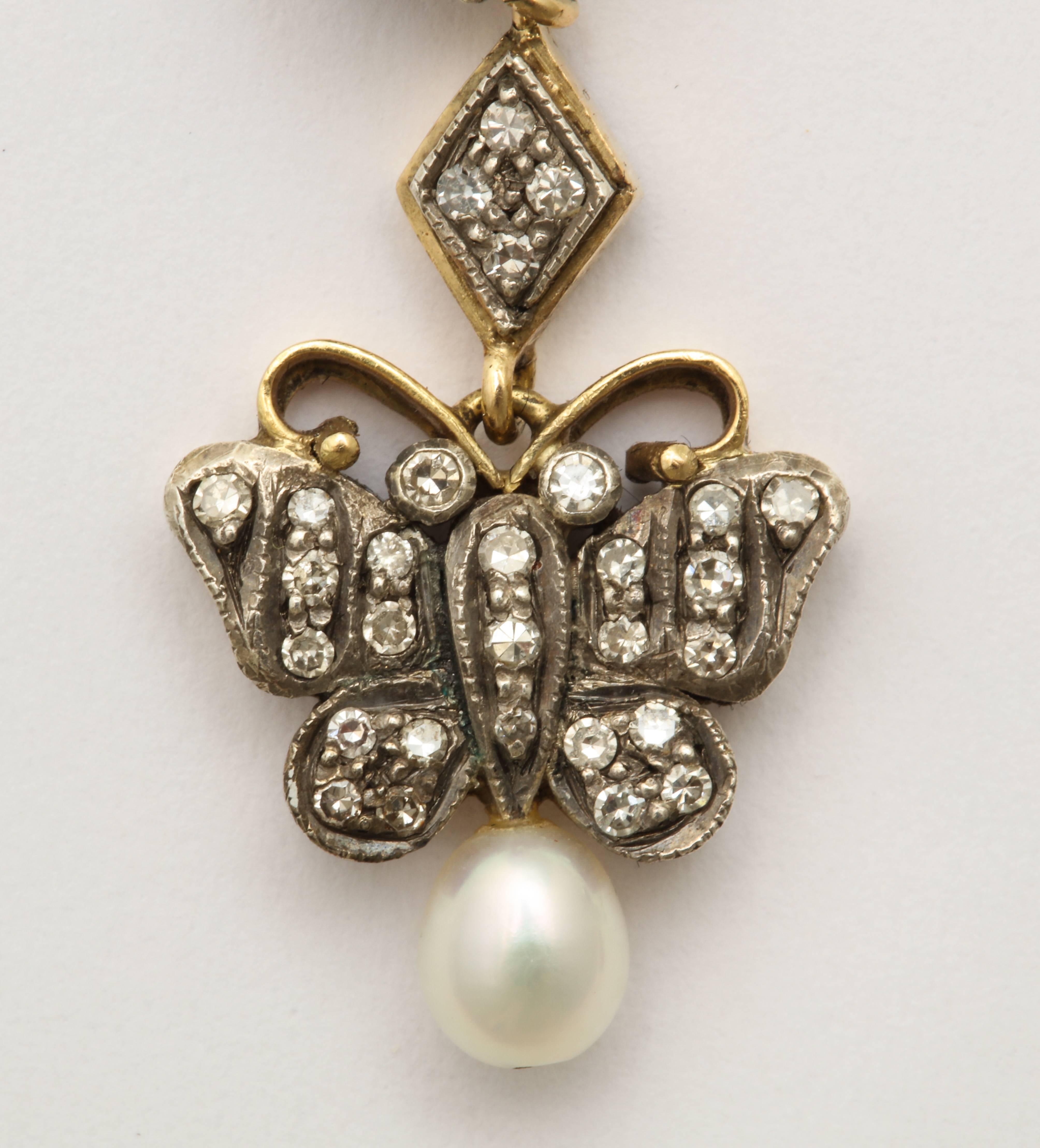 Antique Gold and Silver Diamond and Pearl Butterfly Drop Earrings In Good Condition In New York, NY