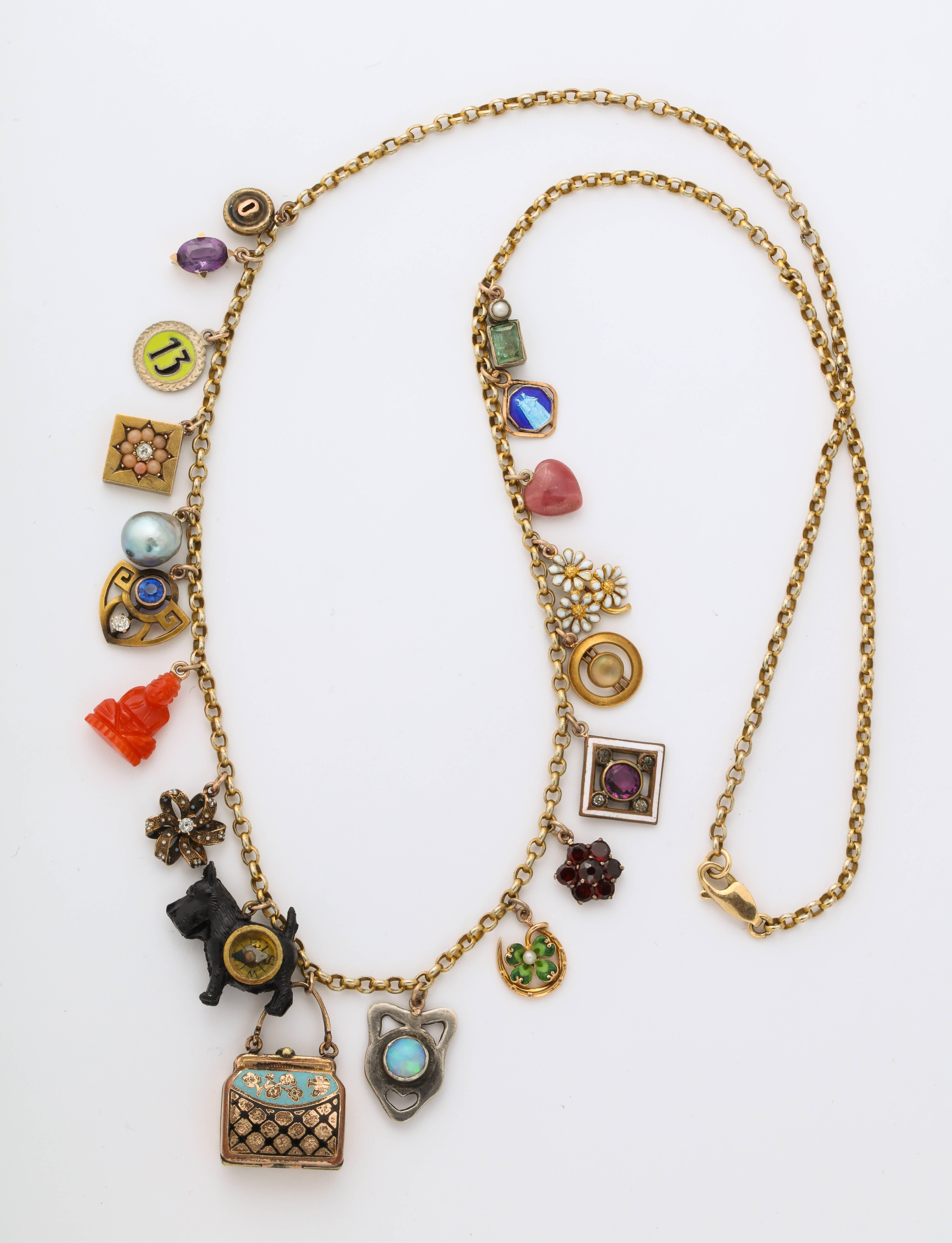 Pocca Book 19 Piece Gold Charm Necklace by Katherine Wallach In Good Condition For Sale In New York, NY