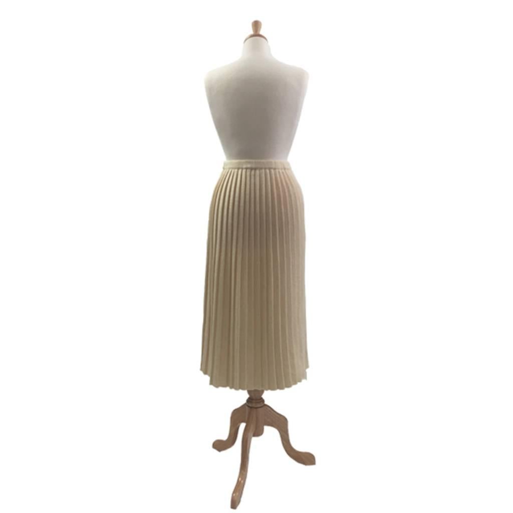 Simply the best pleated skirt for Autumn and Winter, banded elasticated waistband, shaped pleats, fabulous to wear.

 
LABEL – Courreges, Paris, Size/Taille L

FABRIC/FIBRE/MATERIAL – 50% Wool/50% Acrylic
Fabric Weight: Medium creating good