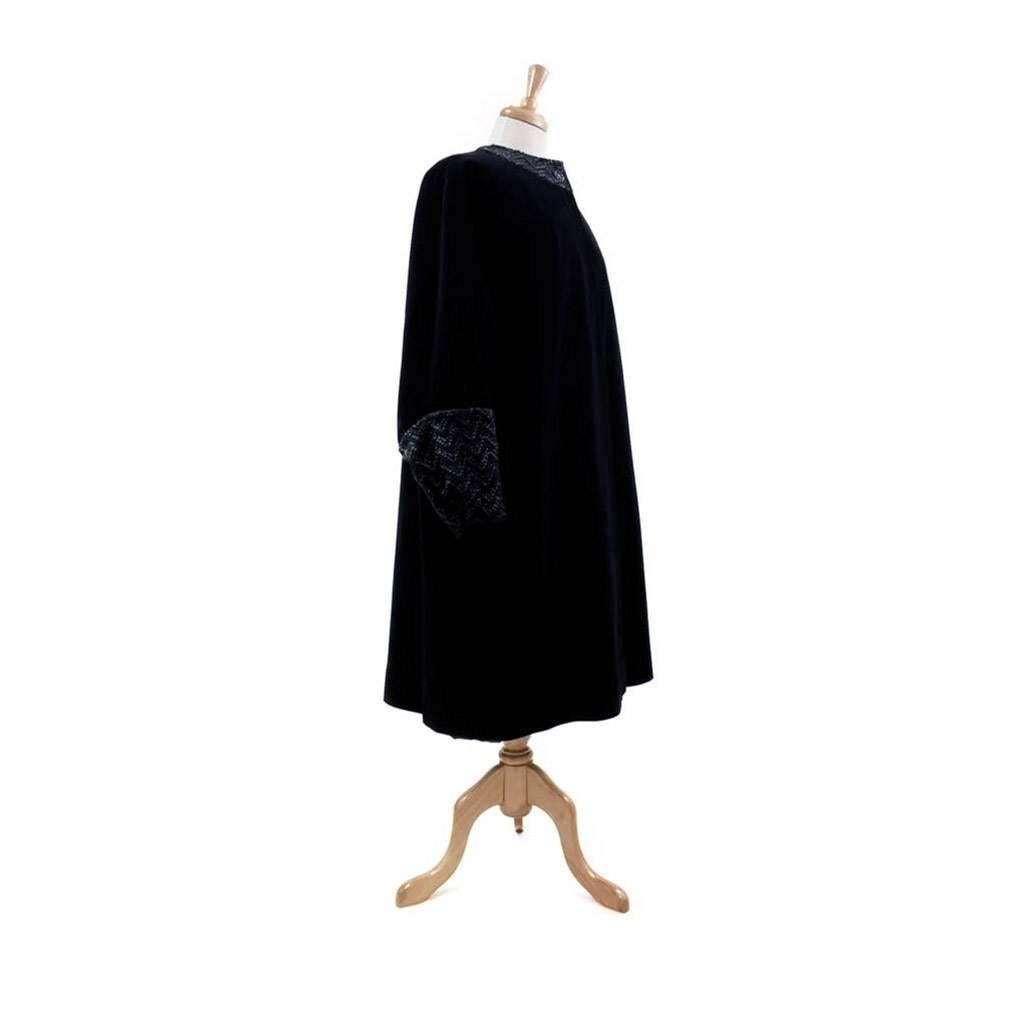 Hand Made Italian evening coat in finest quality heavy cotton velvet – Subtle zig-zag contrasting cuff and neckline insets with embroidery in wool, black lurex chenille and silk. Raglan Sleeves, shoulder darts and diamond shaped underarm