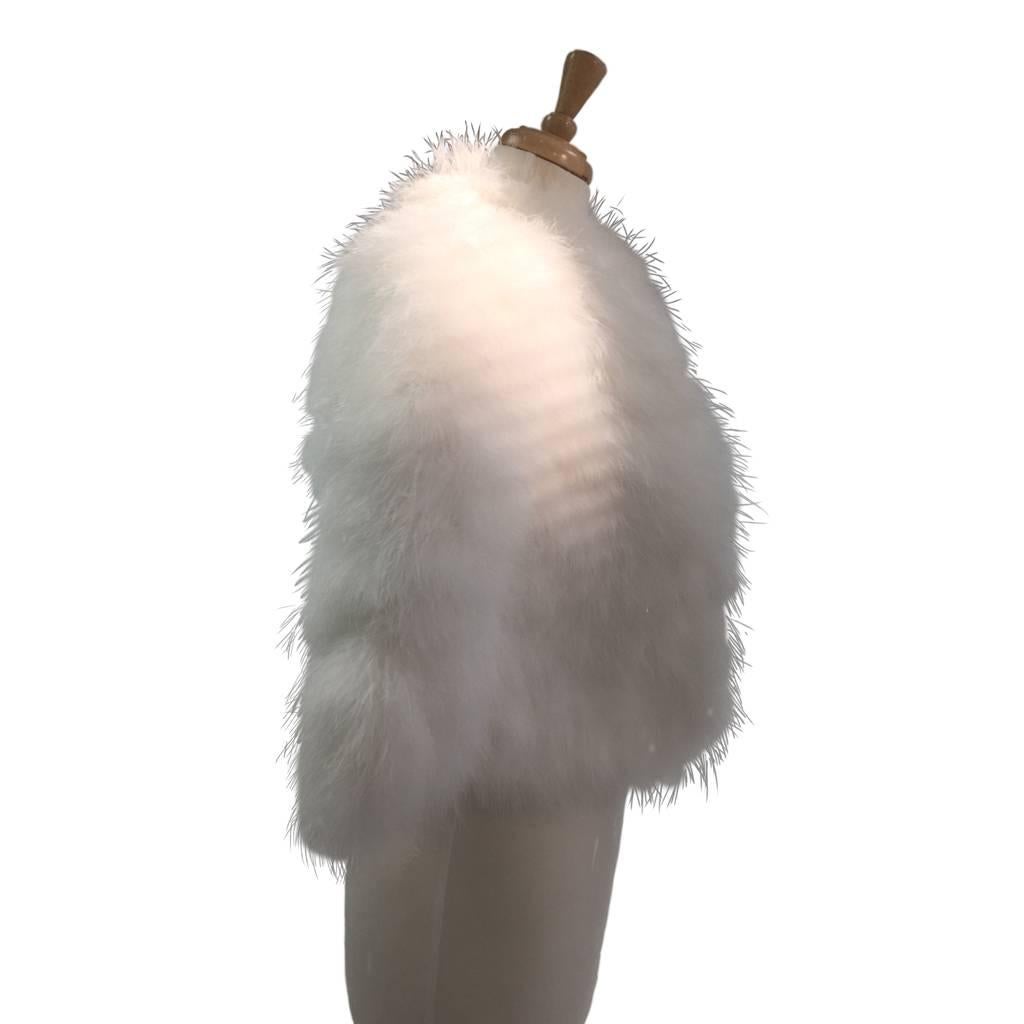 Very Studio 54 meets Kate Moss December 2013 British Vogue Cover!
Think Wedding wonderland!

The softest, lightest, creamy white marabou feather bolero. 
Raglan sleeves, lined in plain white rayon with narrow cream braid trimming. Handmade by a