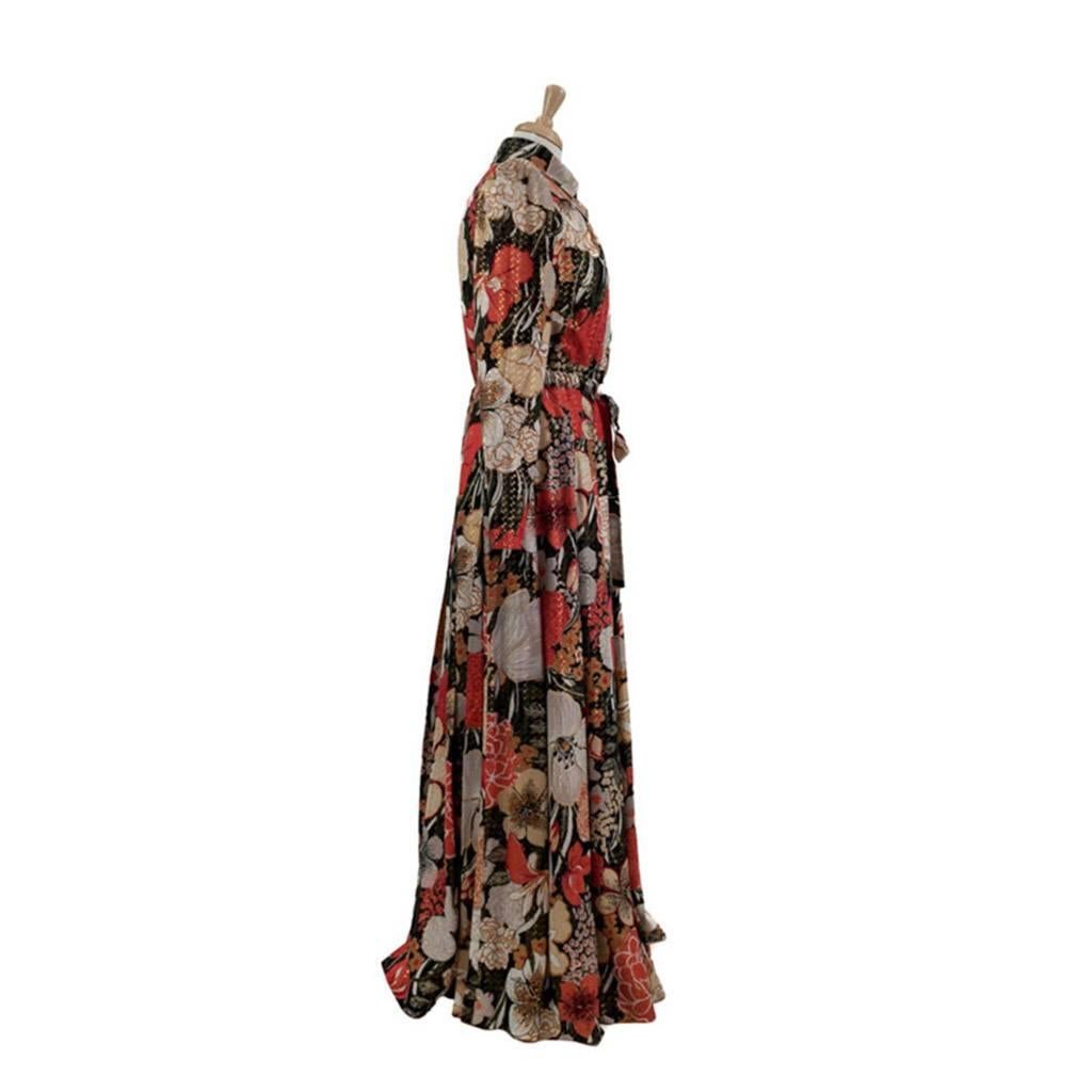 Classic 70s Maxi Shirt dress in dramatic Wallpaper floral print, with long narrow puffed sleeves puffed at top.
Waist has a long tie belt enclosed inside a rouched band
5 Gold coloured plastic buttons with wood effect insert down front of shirt
and