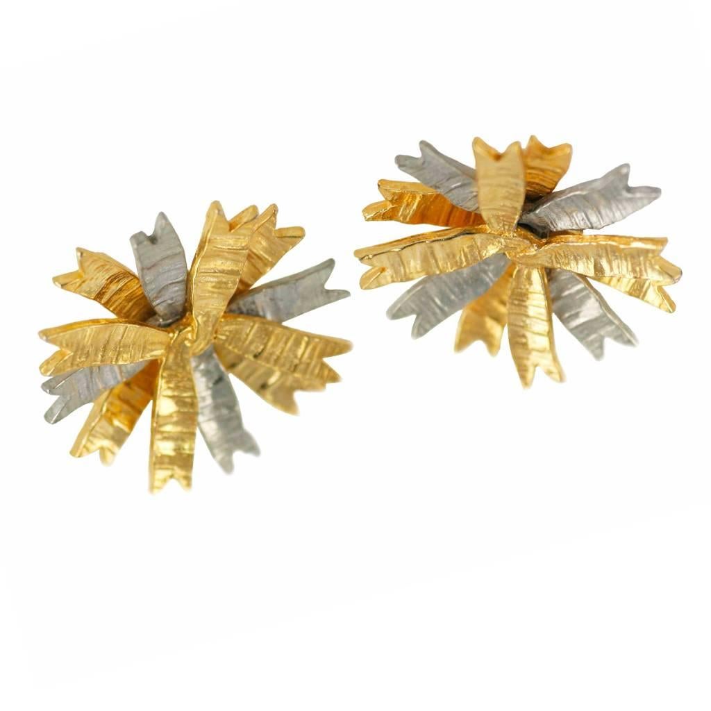 This pair of unusual star shaped clip on earrings, created during the first decade of Kenneth Jay Lane’s artistic development, completely capture the whimsical and minimalist style of the time. The two colours of plated gold and silver on metal,