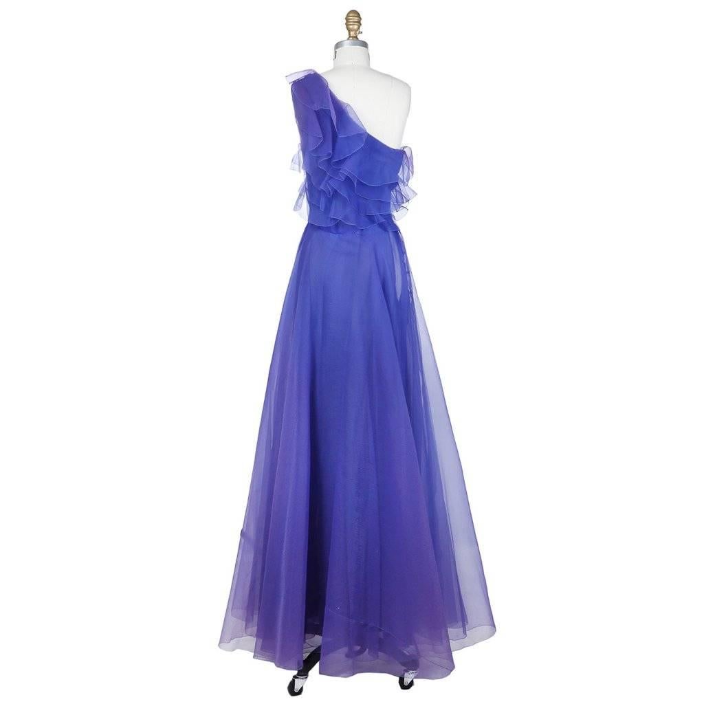 Haute couture silk organza gown by Christian Dior
Autumn/Winter 1972 Collection
Floor length
One Shoulder
Ruffled bodice
Blue lining topped with lightweight purple organza; gives chameleon-like effect
High waist
Material: silk; no content