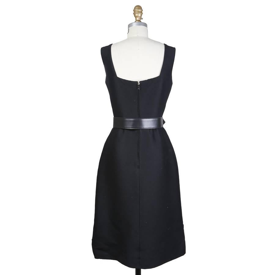 This is a little black dress by Pierre Balmain c. 1960s.  It features 2