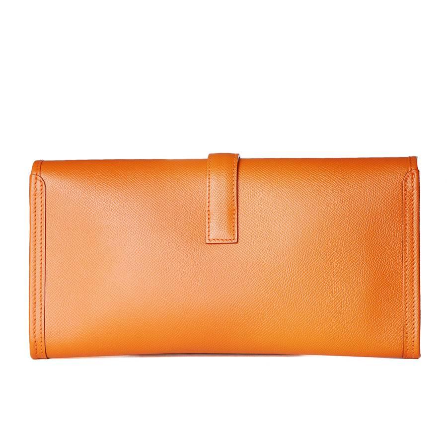 This is an Hermes jige clutch from 2013.  It is made from orange colored epsom leather with same colored sombrero leather interior.  Dust bag included.
11.25
