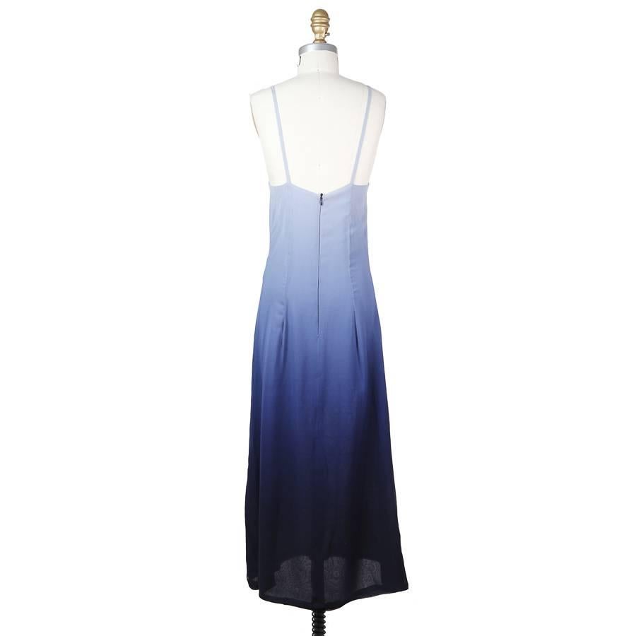 This is a double layered and lightweight wool slip dress by Todd Oldham c. mid 1990s.  It features a periwinkle-to-navy ombre.  