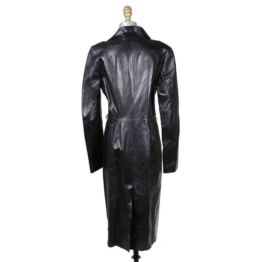 This is a modern black leather coat by Gucci.  It features blunt cut edges and no lining.  Hidden front zipper closure.

17