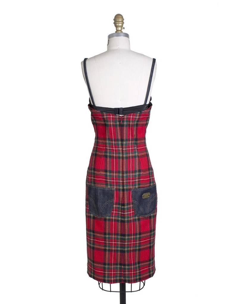 This is a wool tartan dress by D&G.  It features denim straps and two denim back pockets. Satin lined and features an attached satin bra.