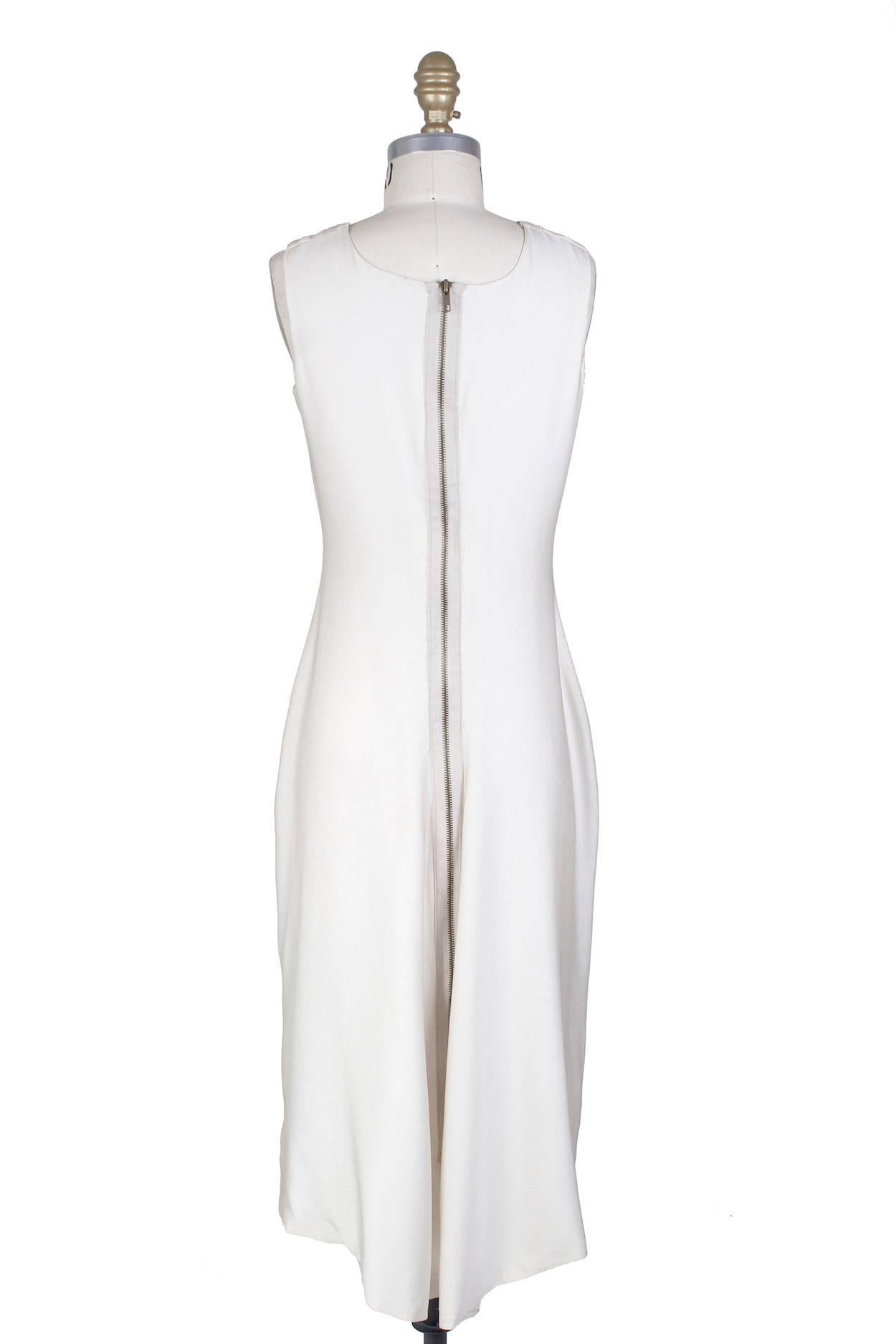 This dress is 1 of 2 ever made. It was Look 22 worn by Stella Tennant in the Spring 1996 Ready to Wear 