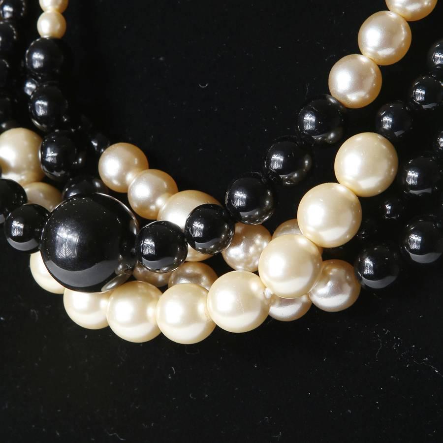 Necklace strand of black and white pearls by Chanel.  16.5
