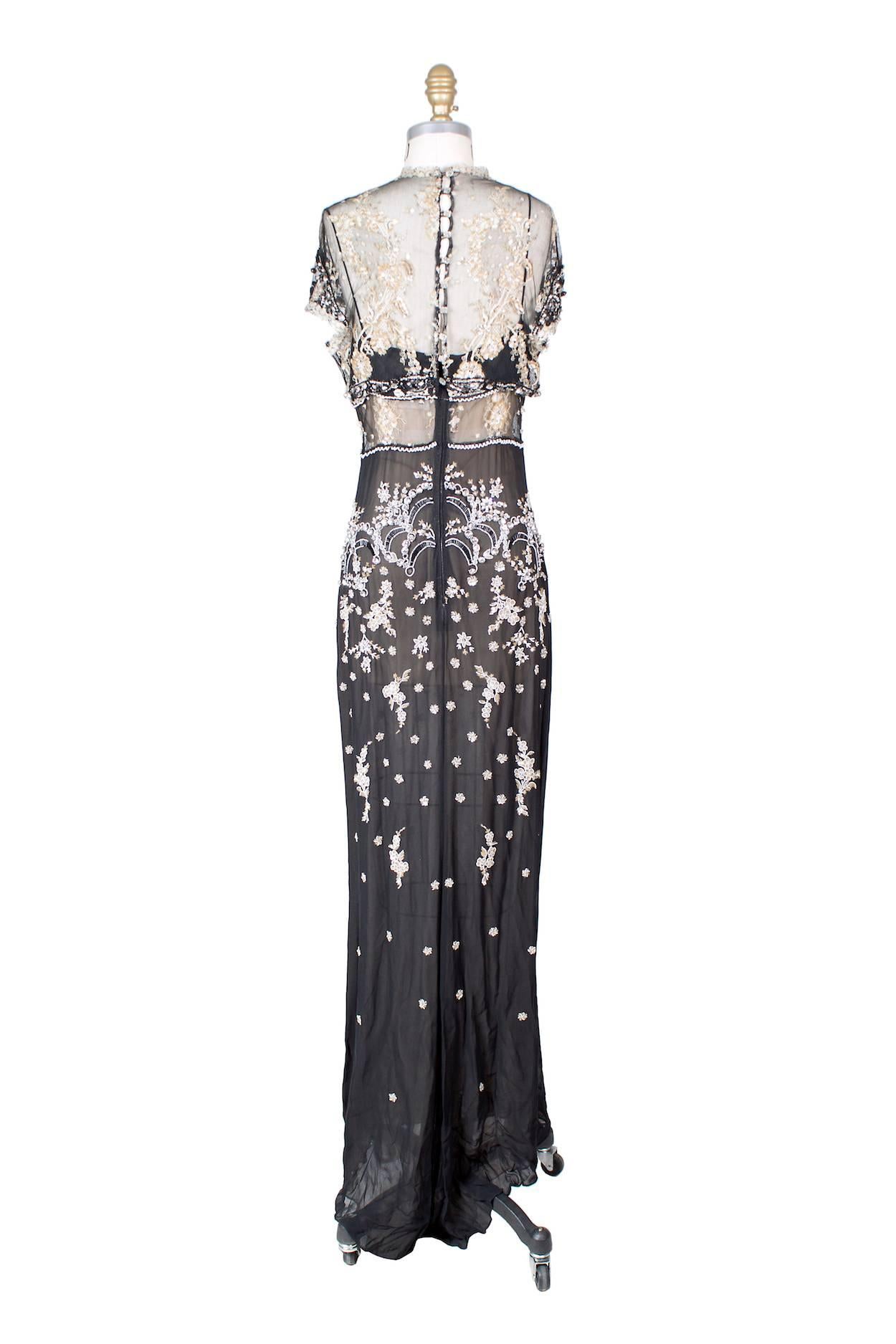 This is a contemporary dress by Badgley Mishka.  It features beaded and embroidered mesh and chiffon and includes an attached slip and lining.  The closure is a hidden zipper down the back with buttons.  
